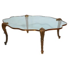  Table basse française en laiton moulé et verre signée P.E. Guerin