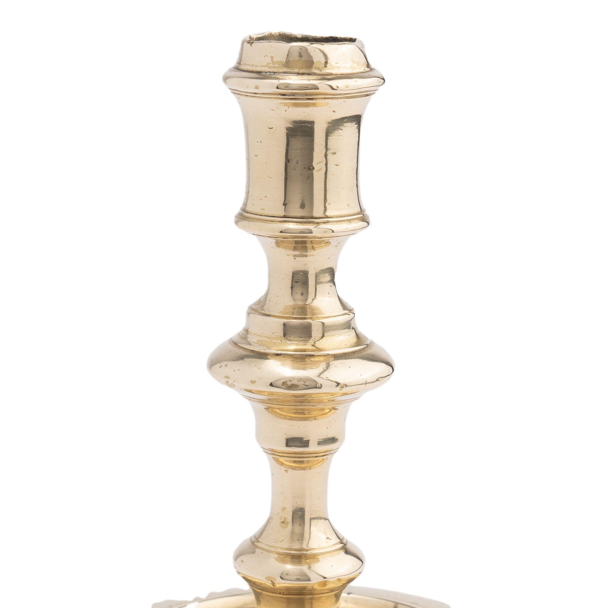 18th Century French cast brass circular base candlestick, 1720 For Sale