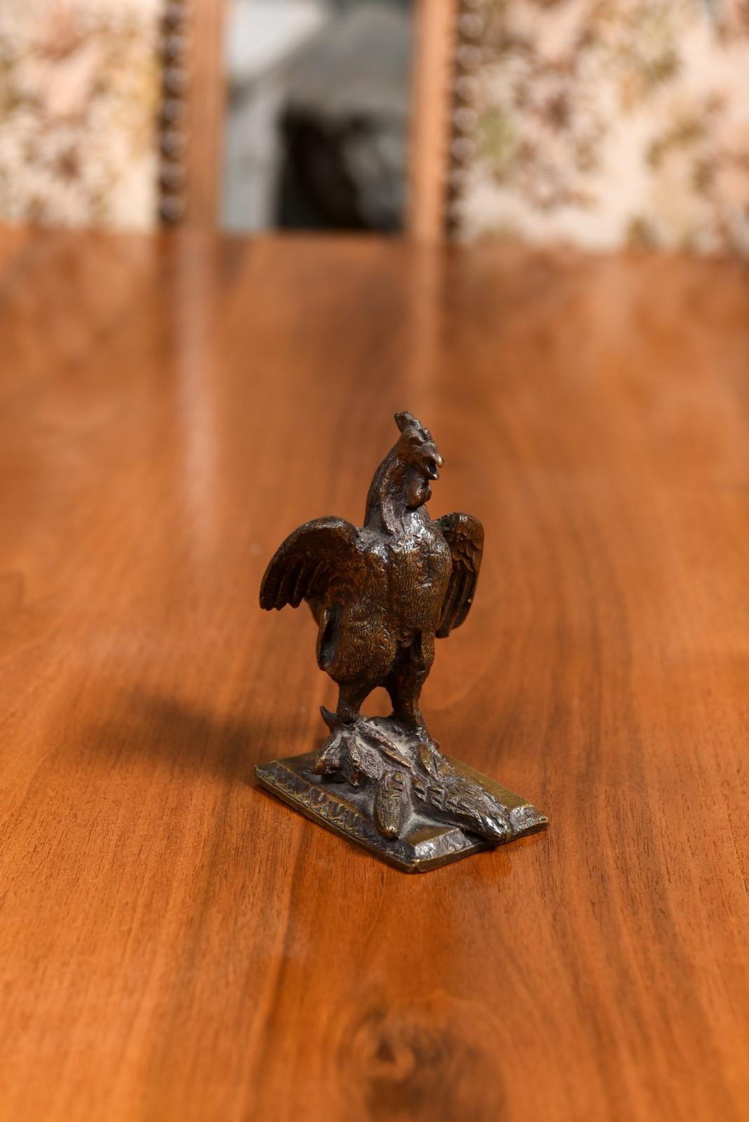 Patinated French Cast Bronze 19th Century Rooster Sculpture with Wings Extended Backwards For Sale