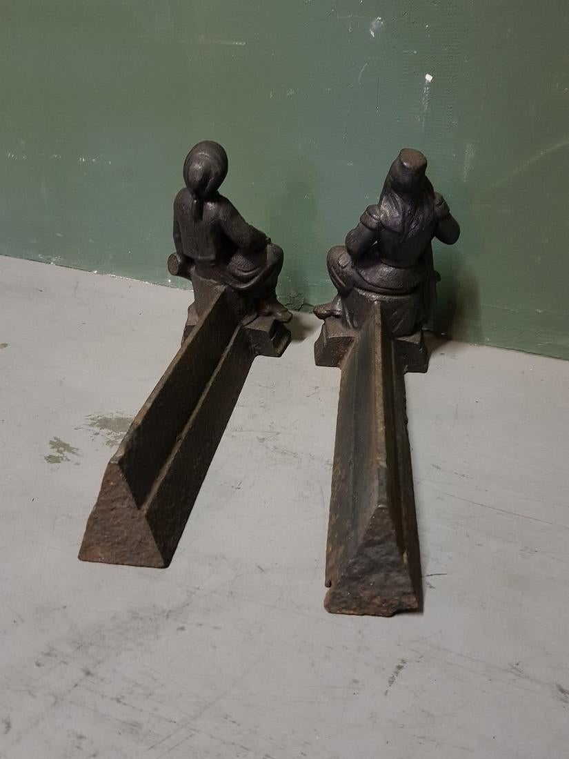 French Cast Iron Andirons with Persons Sitting on a Drum, Early 20th Century For Sale 2