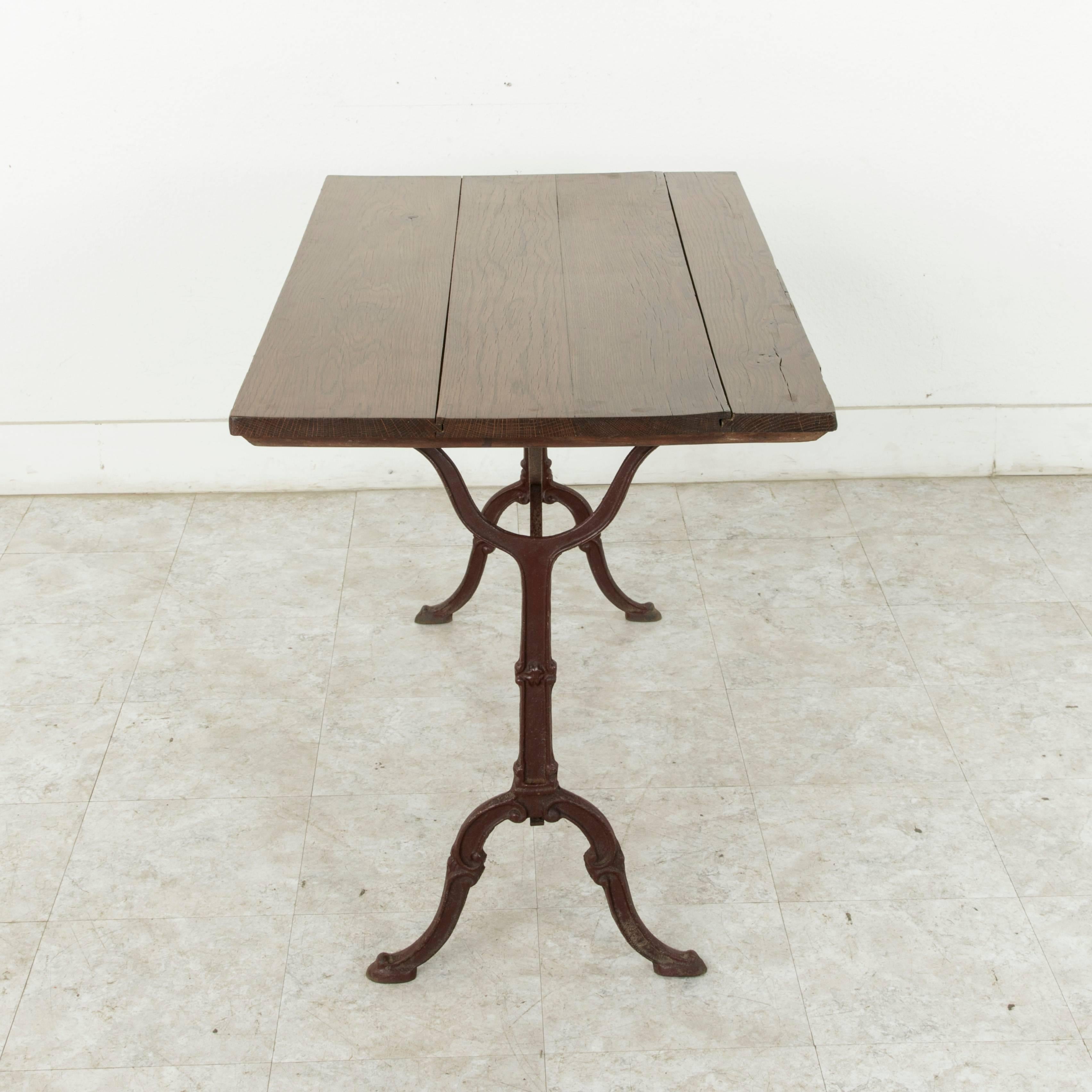 Early 20th Century French Cast Iron Bistro Table or Cafe Table with Oak Top, circa 1900