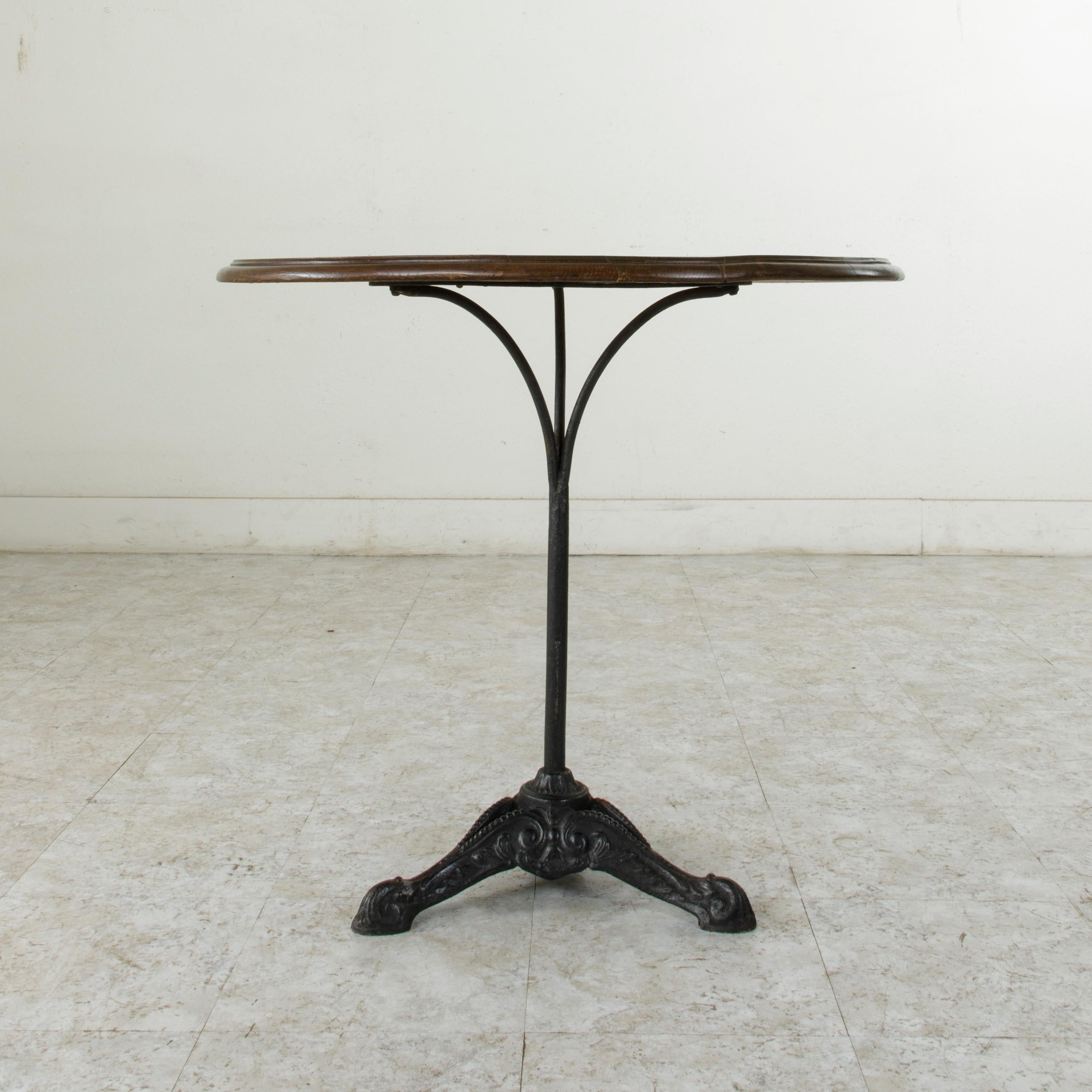 French Cast Iron Bistro Table or Cafe Table with Round Walnut Top, circa 1900 In Good Condition In Fayetteville, AR