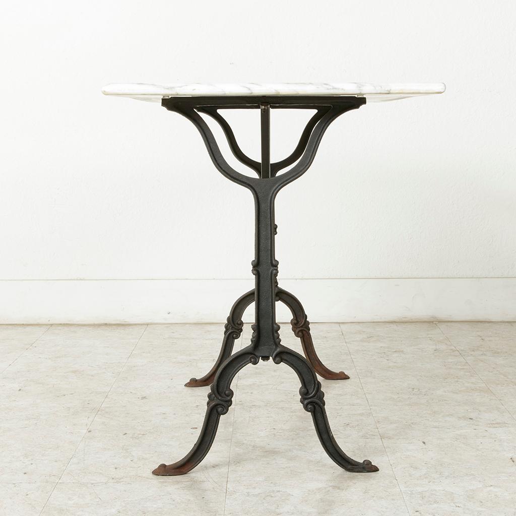 Early 20th Century French Cast Iron Bistro Table or Outdoor Garden Table with Marble Top circa 1900