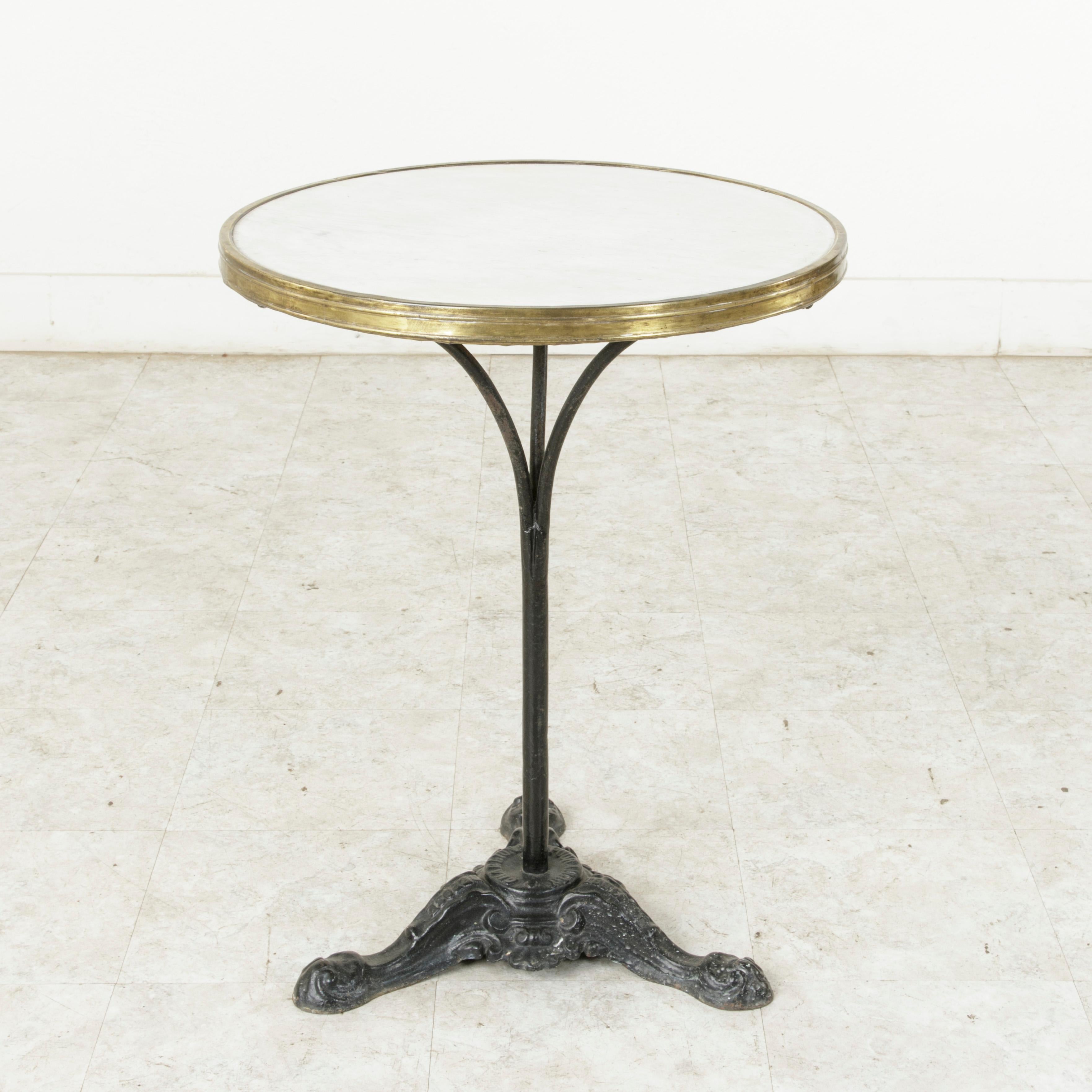 Early 20th Century French Cast Iron Bistro Table with Marble Top and Brass Banding, circa 1900