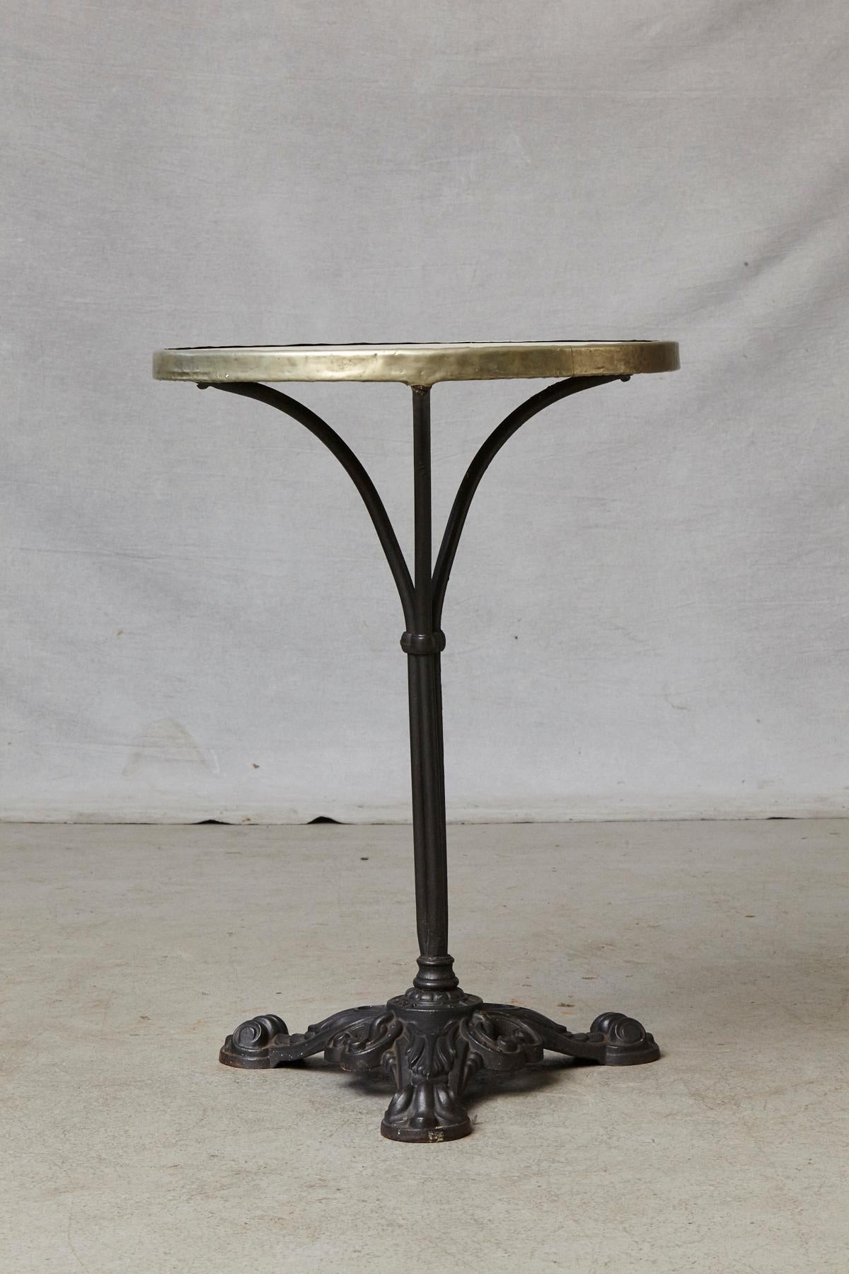 20th Century French Cast Iron Bistro Table with Marble Top and Brass Rim, circa 1920s