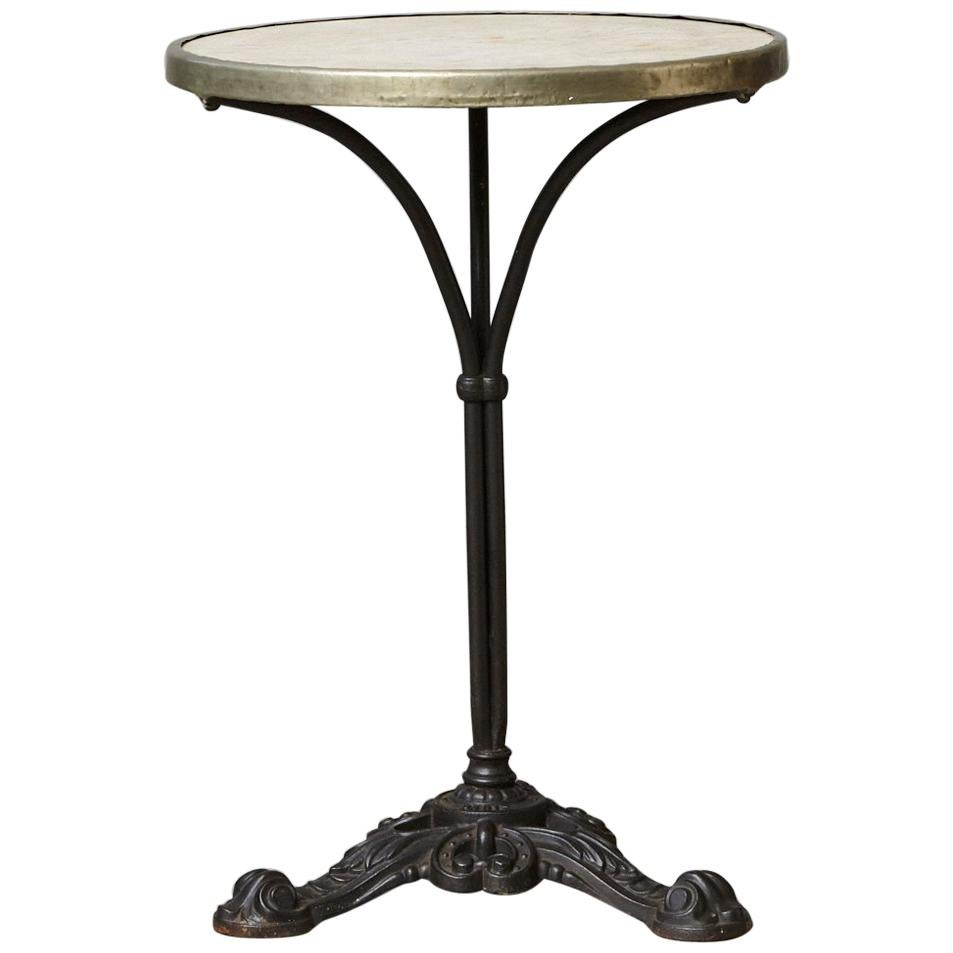 French Cast Iron Bistro Table with Marble Top and Brass Rim, circa 1920s