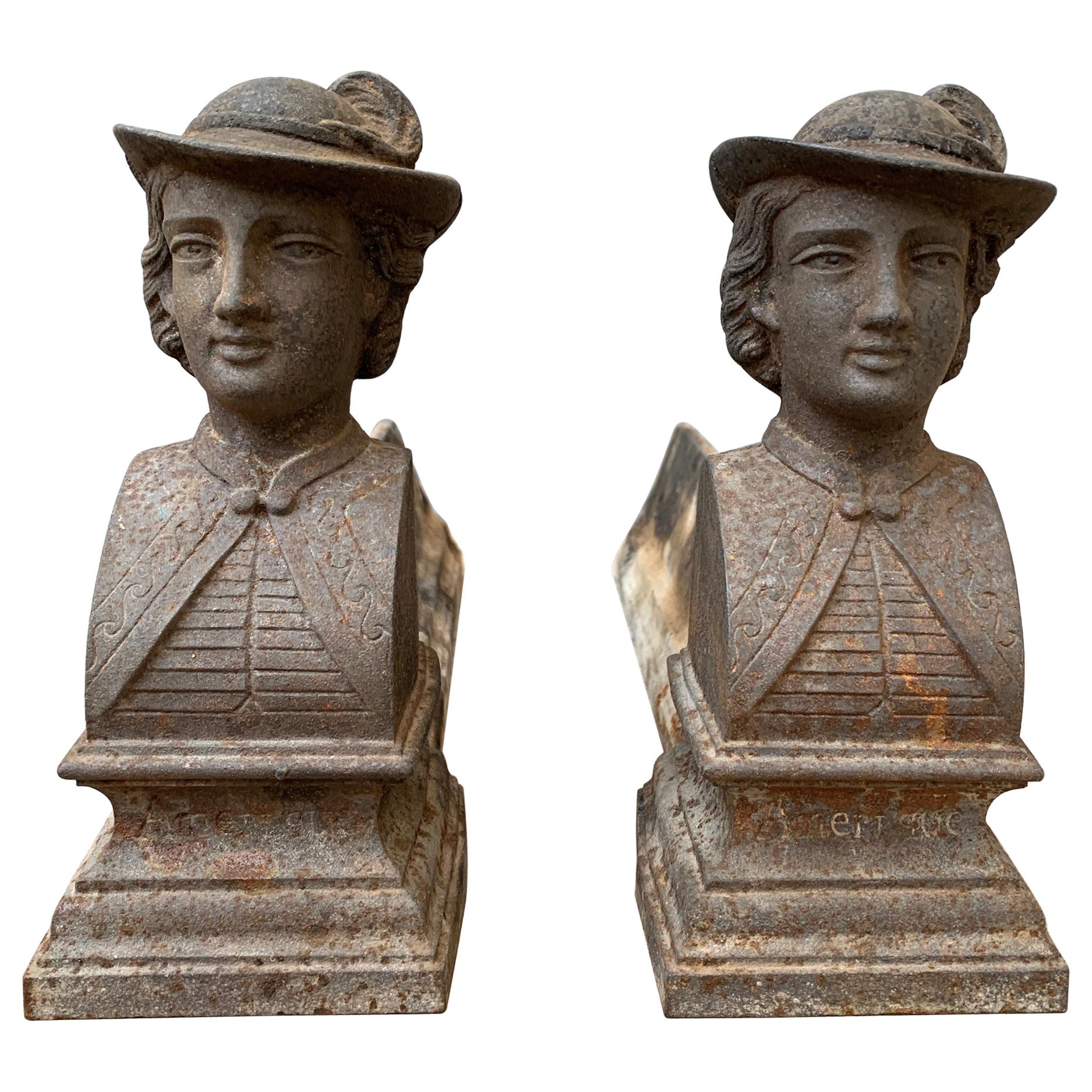 A pair of 19th century French firedogs or andirons in cast iron stamped 