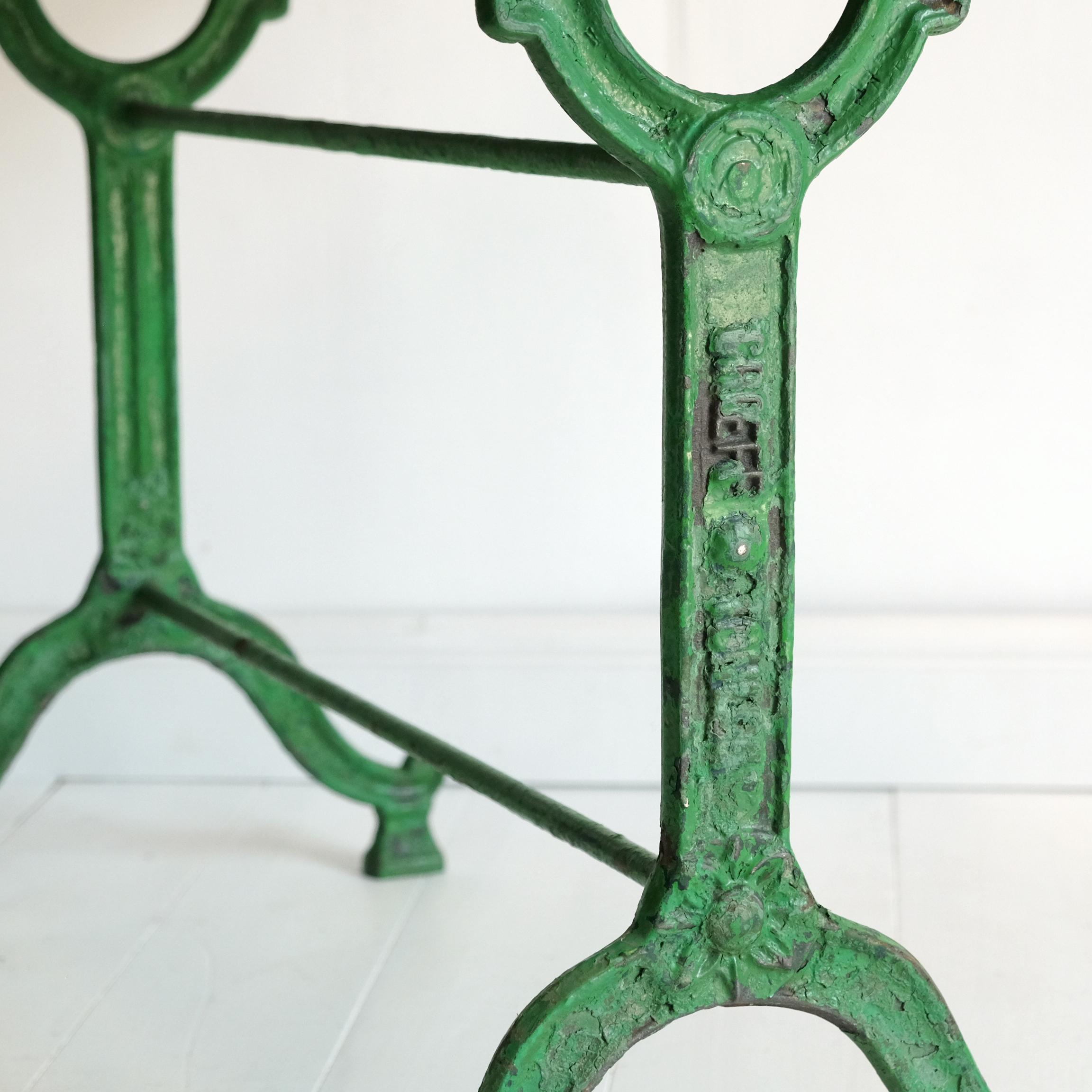 green cast iron garden table