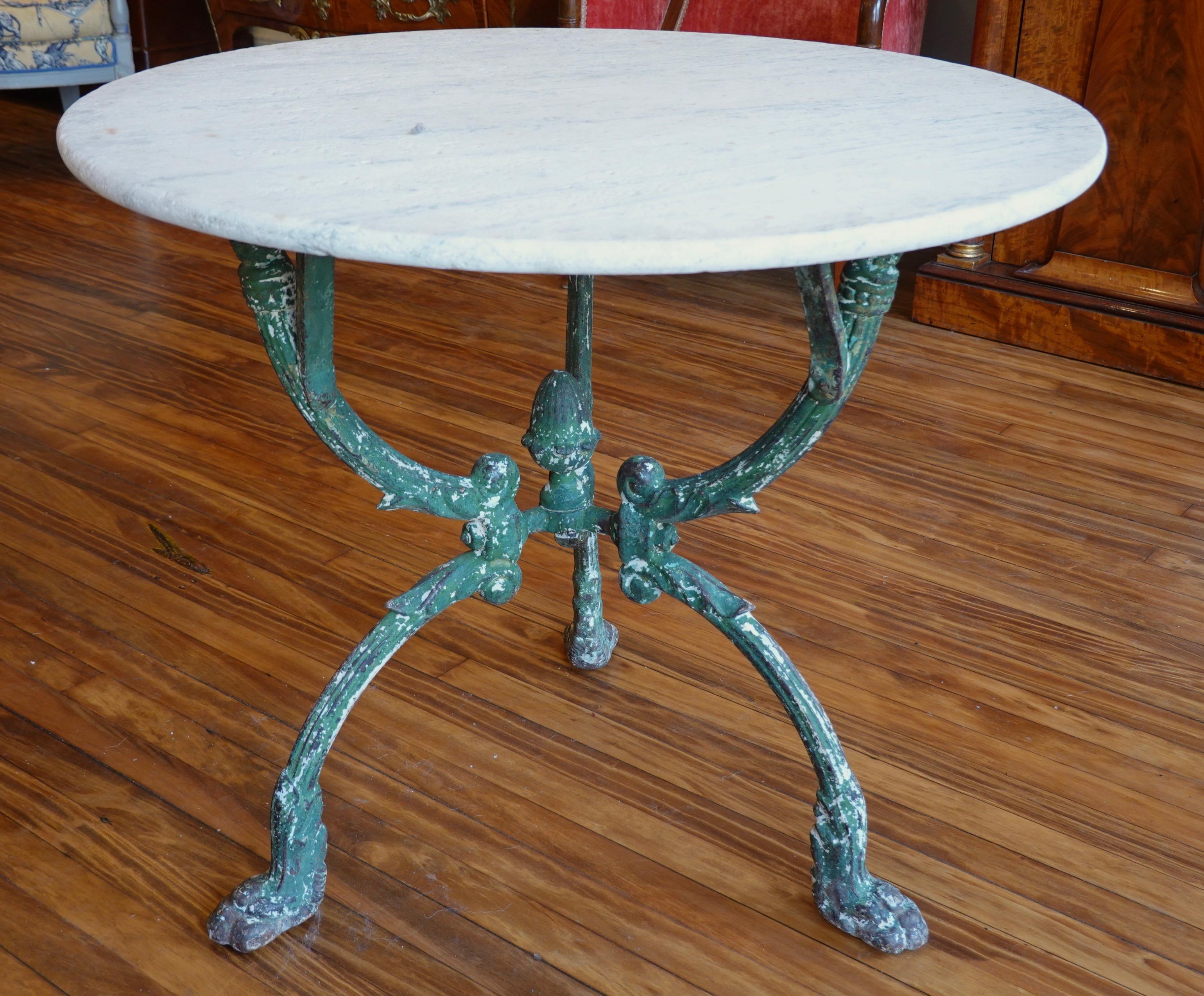 marble top wrought iron table