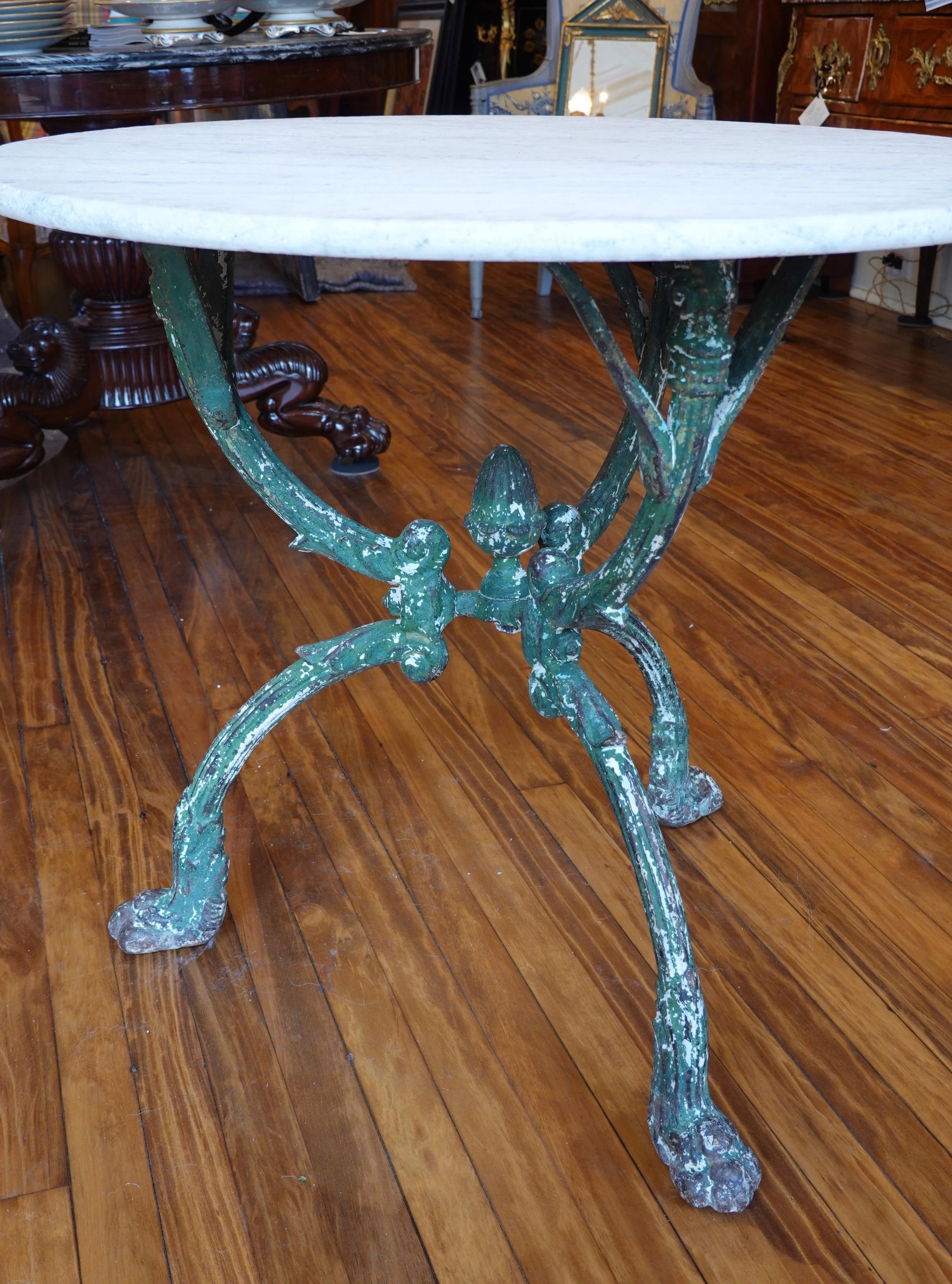 cast iron table with marble top