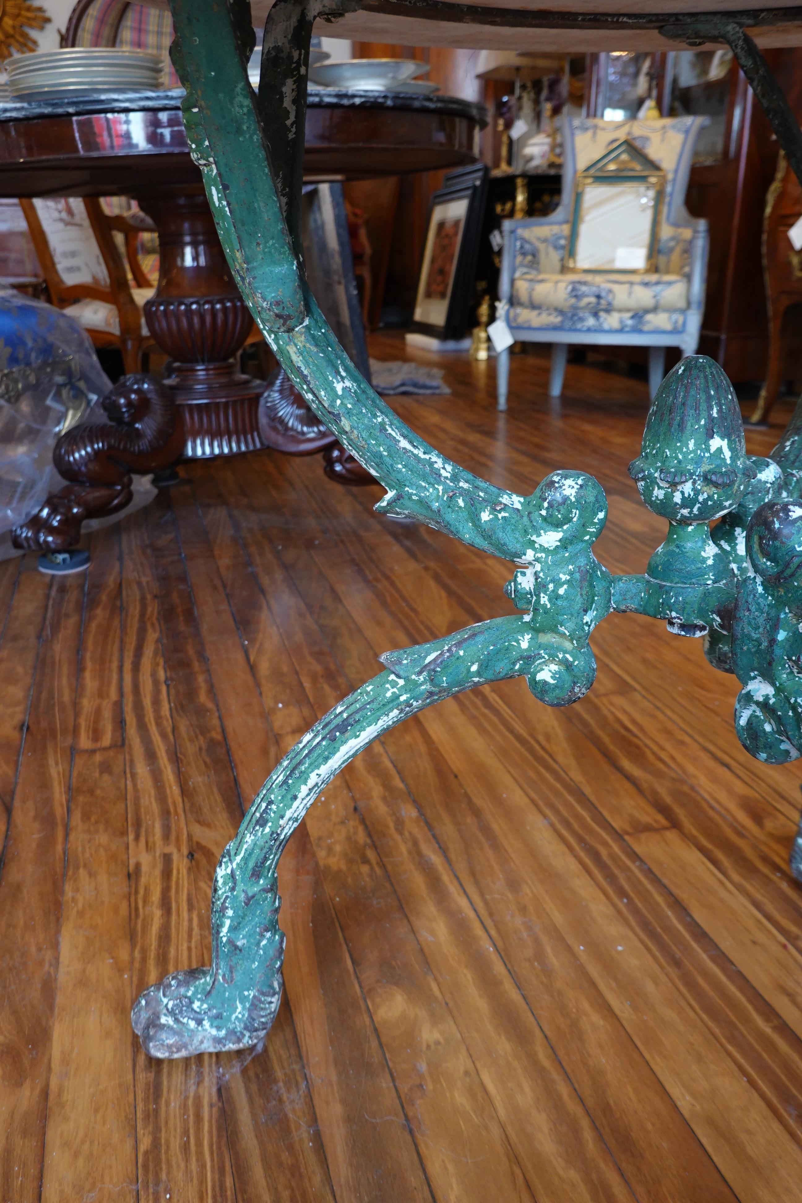 French Cast Iron Garden Table with Marble Top and Decorative Tripod Base In Good Condition In Pembroke, MA