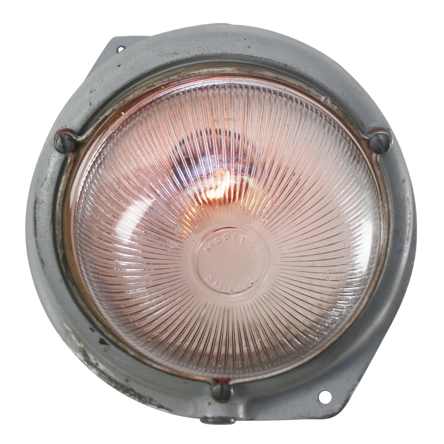 French industrial Sconce, 45 degrees wall light by Mapelec Amiens
Gray cast iron with clear striped glass

Weight: 4.60 kg / 10.1 lb

Priced per individual item. All lamps have been made suitable by international standards for incandescent light