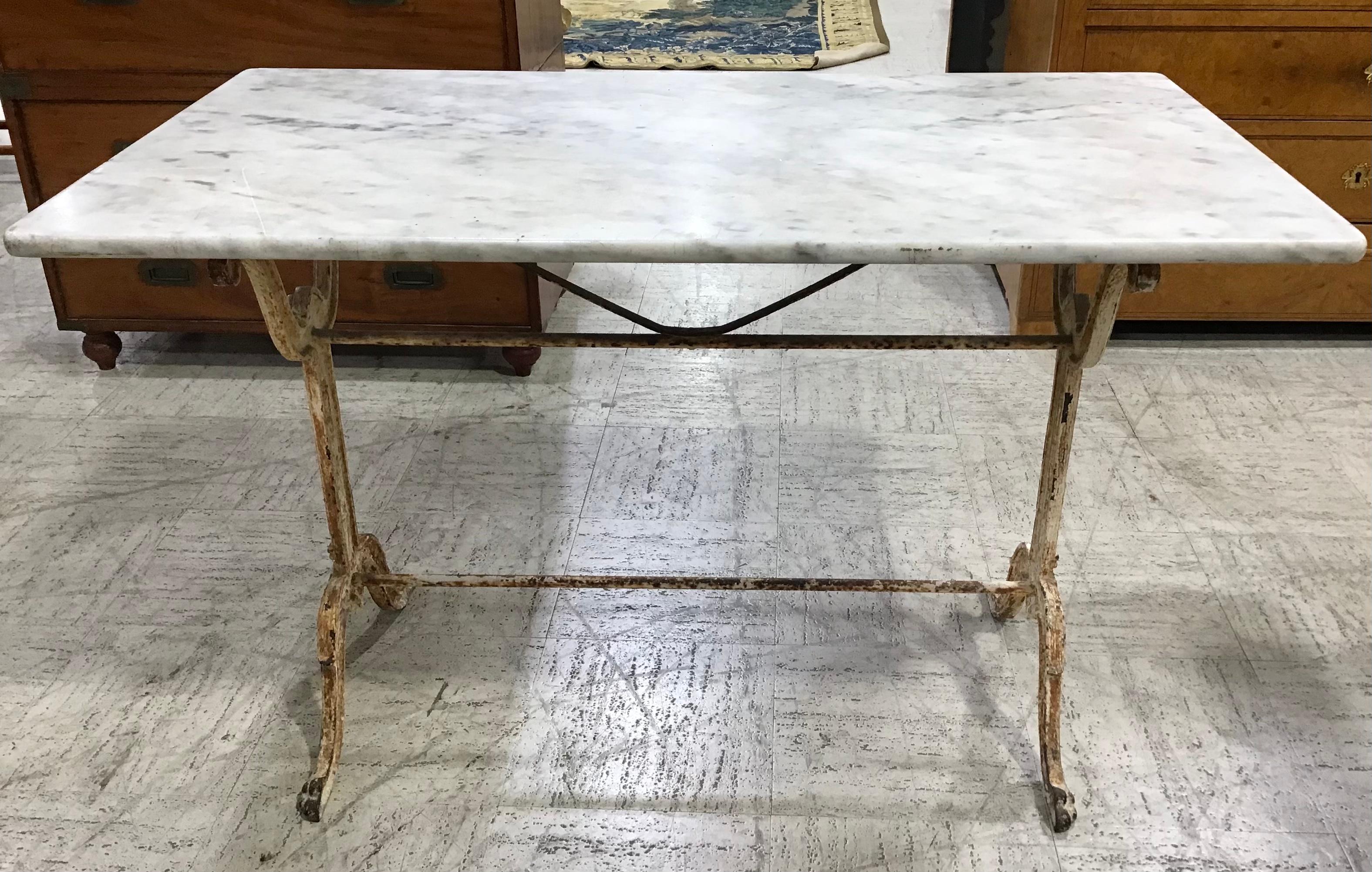 French cast iron marble top bistro table with beautiful white Carrara marble top. Nice patina. Perfect for indoor or outdoor use. Beautiful solid and sturdy.