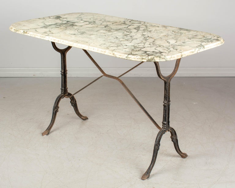 French Cast Iron MarbleTop Bistro Table at 1stDibs