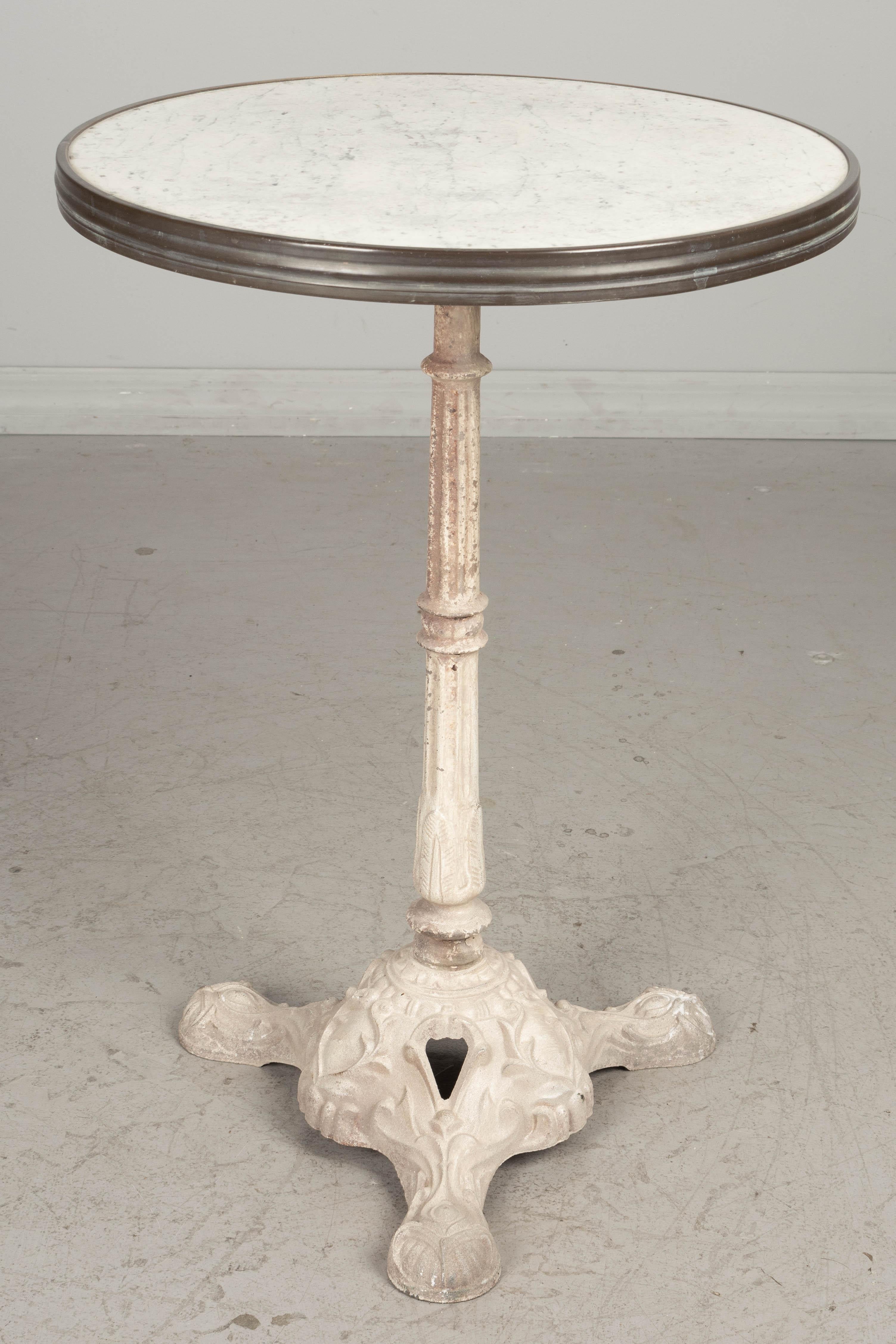 French Cast Iron Marble Top Bistro Table In Good Condition In Winter Park, FL