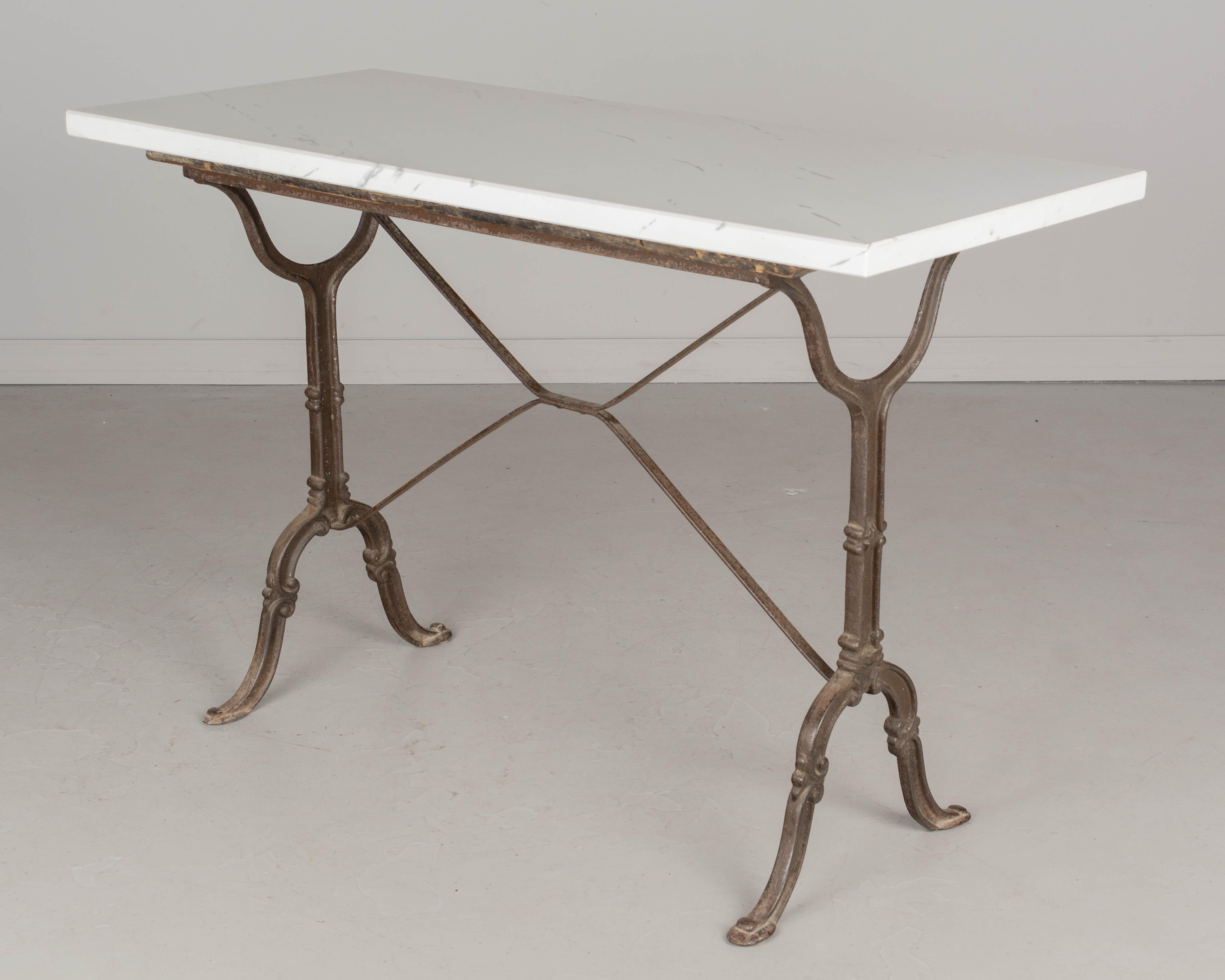 French Cast Iron Marble Top Bistro Table In Good Condition For Sale In Winter Park, FL