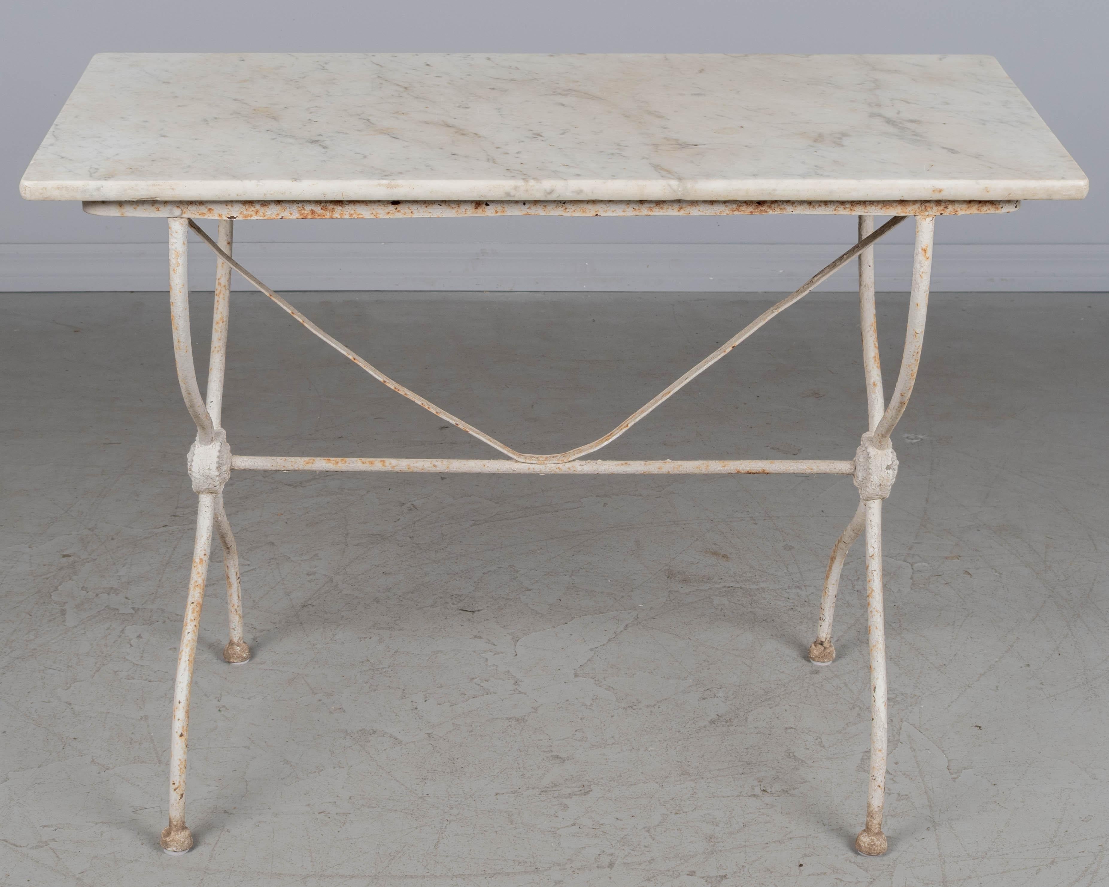 French Cast Iron Marble Top Bistro Table In Good Condition For Sale In Winter Park, FL