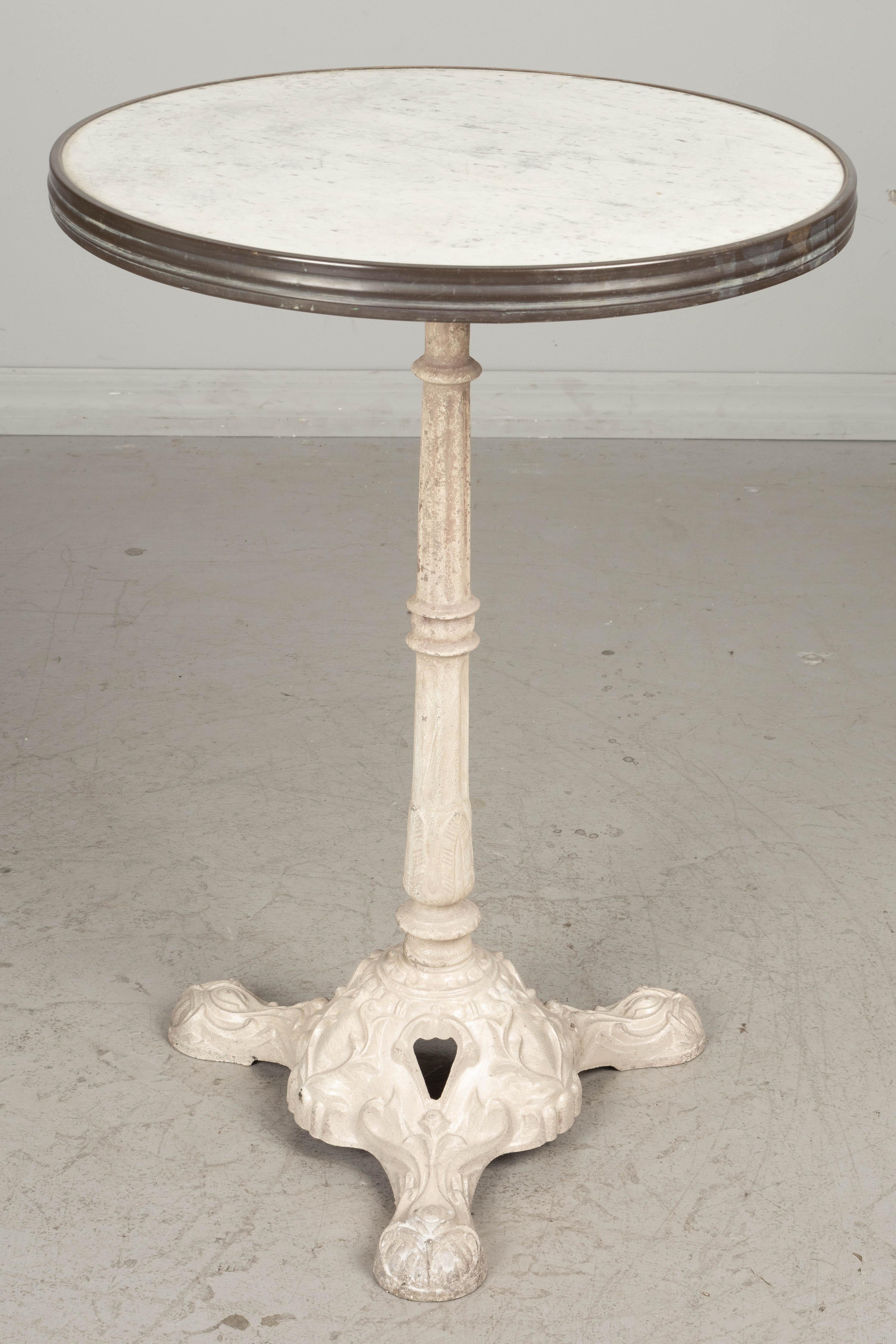 20th Century French Cast Iron Marble Top Bistro Table