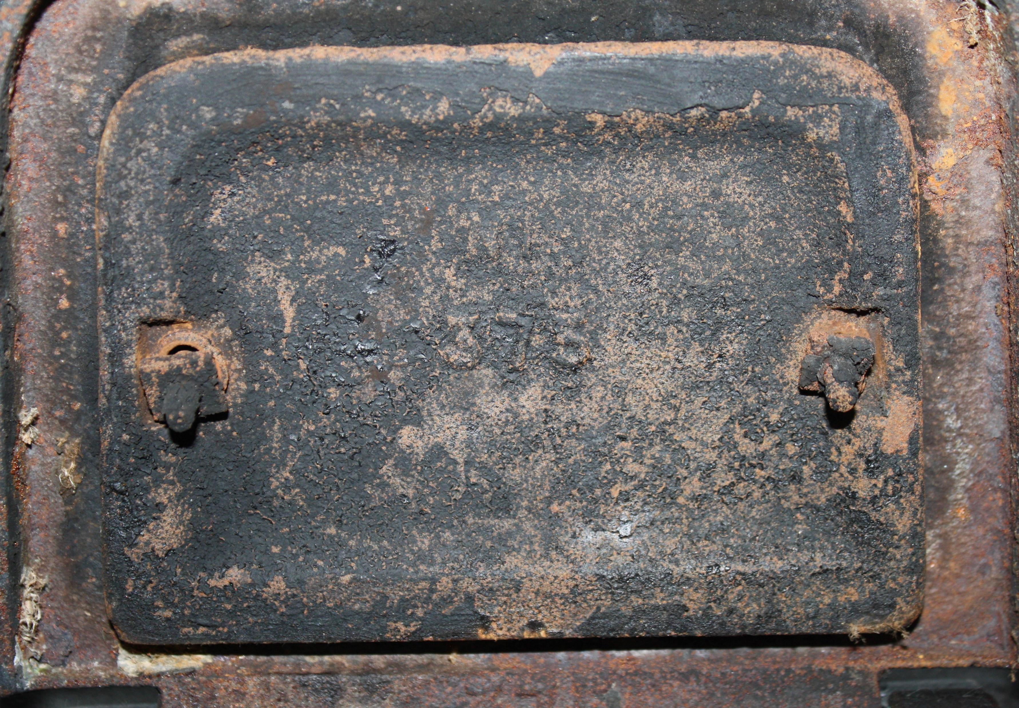 20th Century French Cast Iron Stove with Brass Accents by Godin, circa 1910