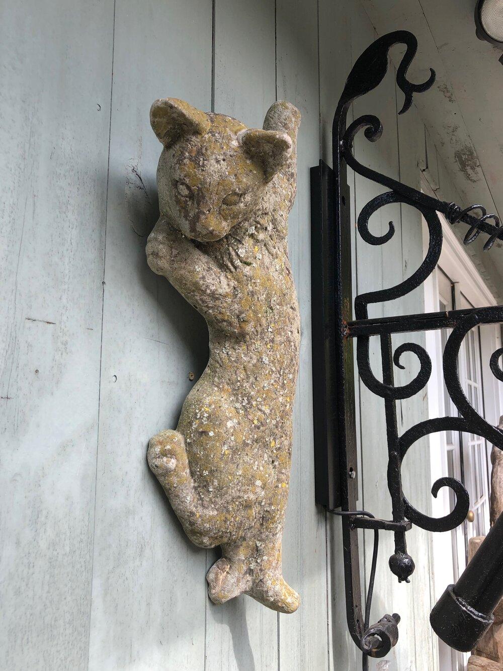 We love this whimsical portrayal of a climbing cat and its surface is patina-perfection! In wonderful condition, the plaque has a sturdy recessed metal hanger on the reverse side to make installation a snap. Place it alongside your door or barn or