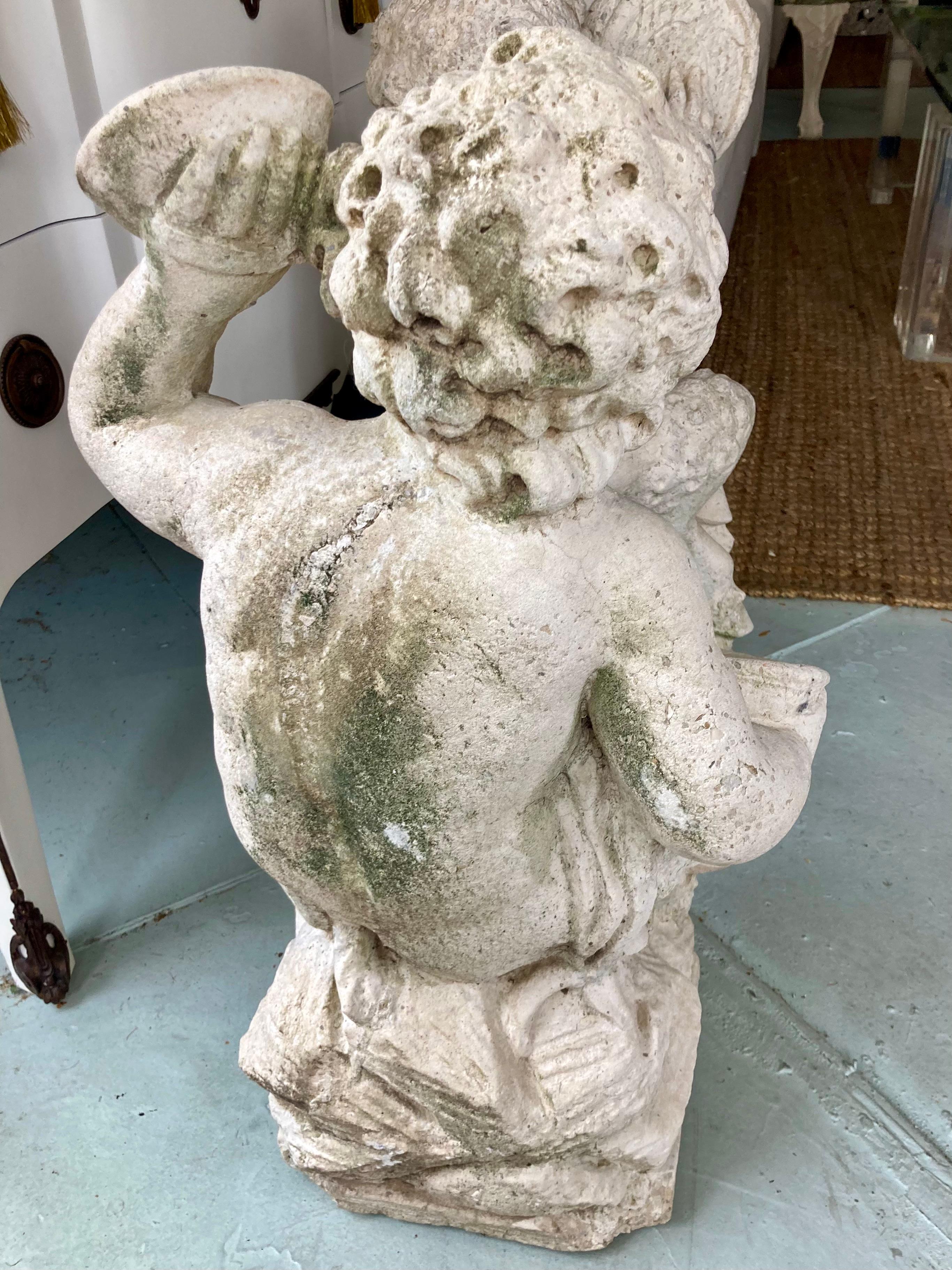 French Provincial French Cast Stone Pan and Putti Musician Sculptures, a Pair For Sale