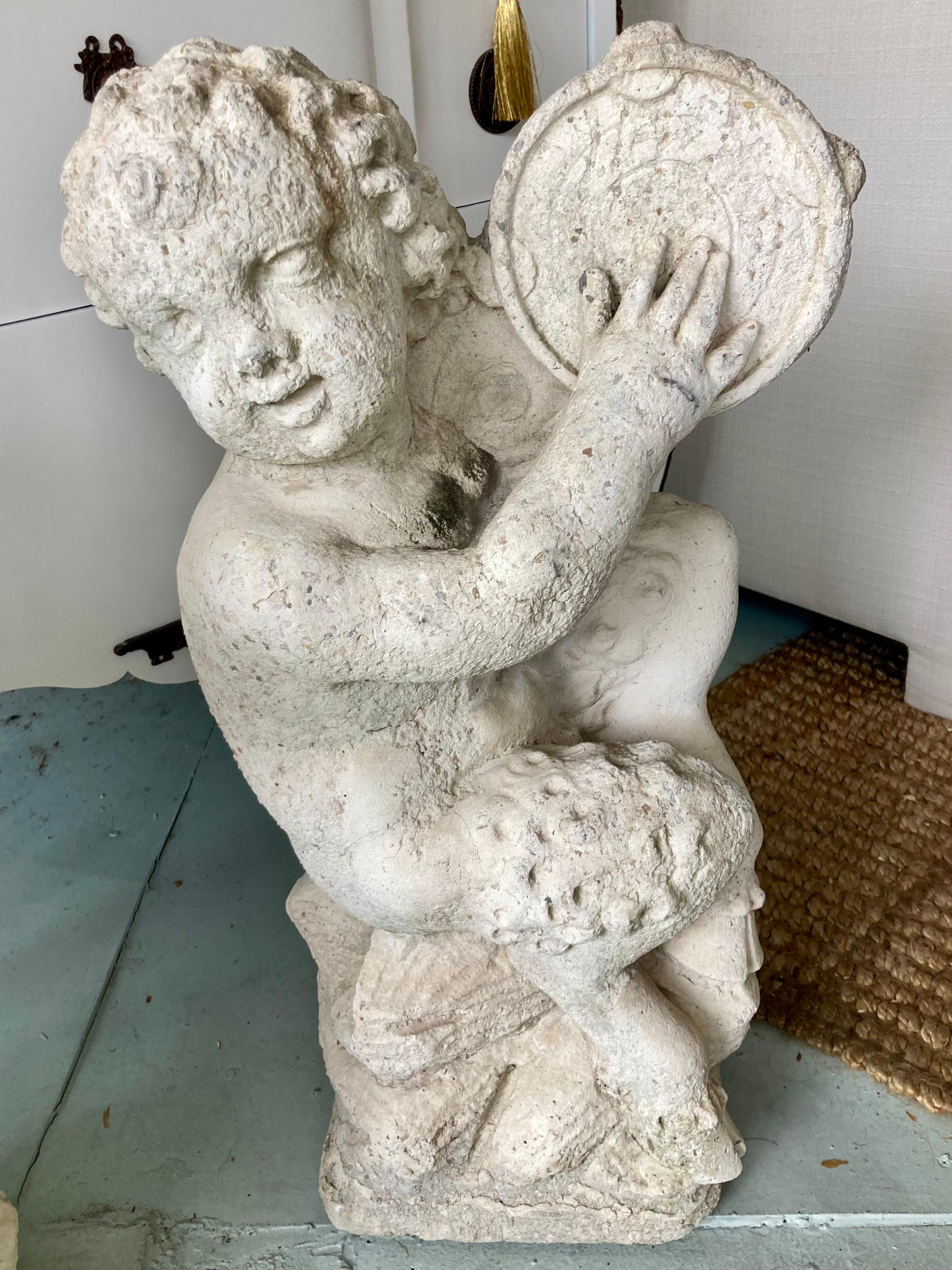 Mid-20th Century French Cast Stone Pan and Putti Musician Sculptures, a Pair For Sale