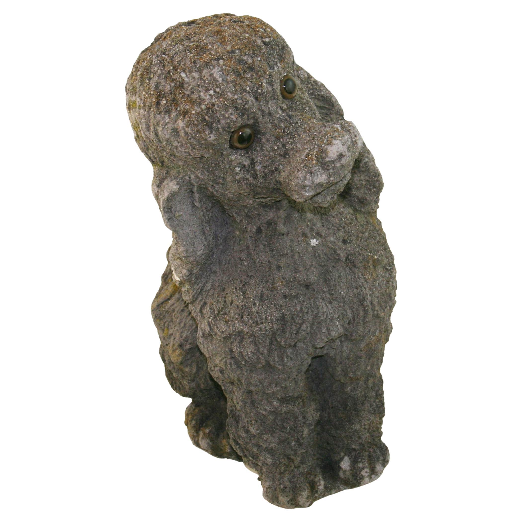 A Stone Stone Dog Poodle Garden Sculpture