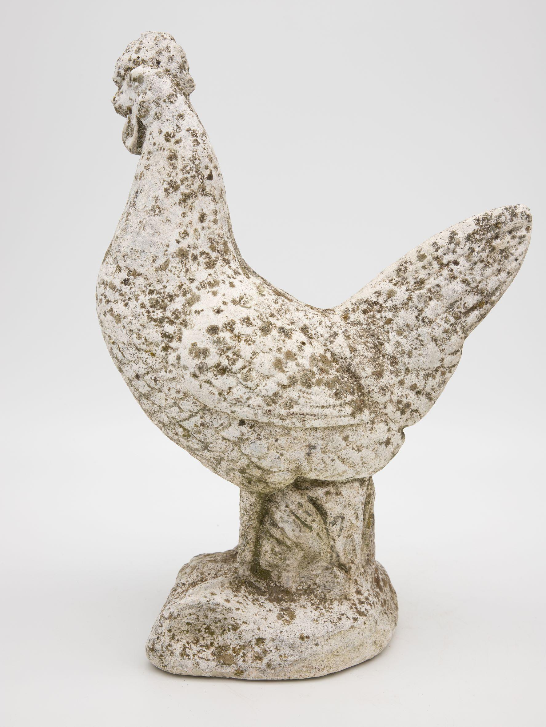 stone rooster statue