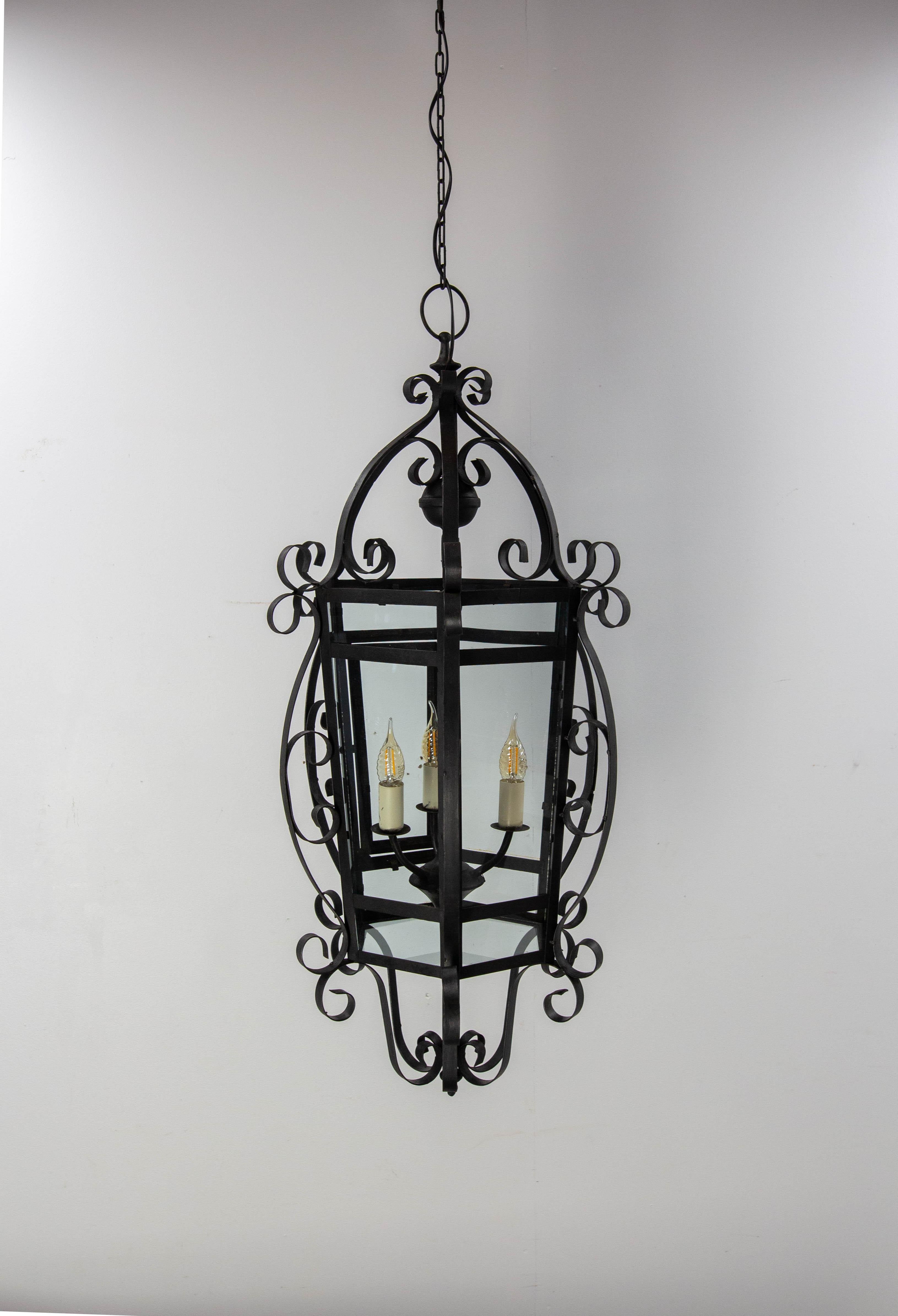 Ceiling pendant, France.
Lustre made in wrought iron and glass.The glass is the original but it is like new.
Soft and pleasant lighting.
Its large size makes it ideal lighting and decoration for a large room or patio
This chandelier is conform to