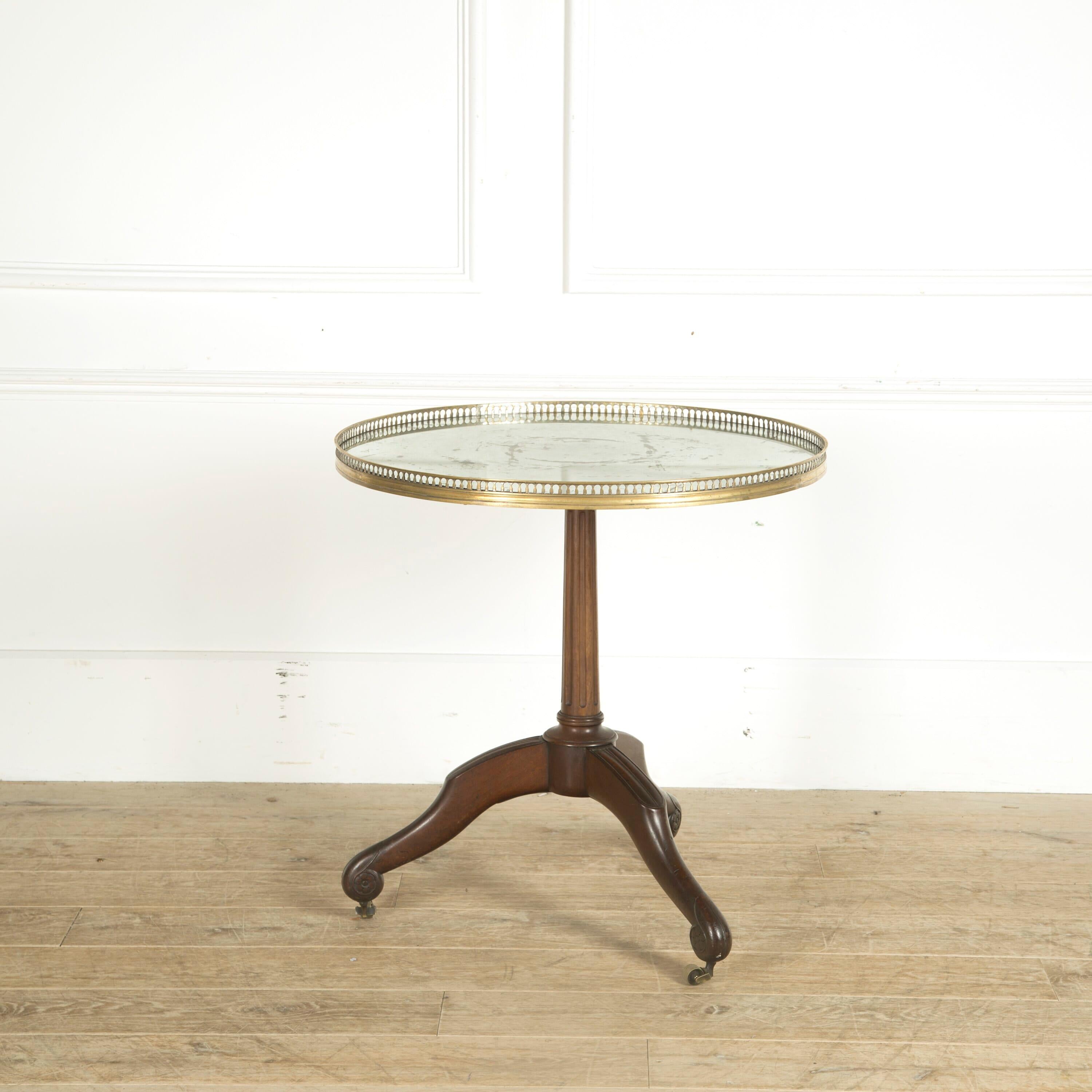 A stylish early 19th century French oak table base with later (19th century) mirrored and galleried top.