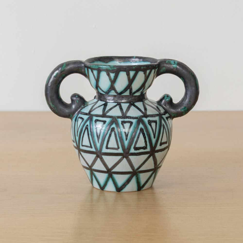 Beautiful petite ceramic vase from France, 1960s. Made Amphora shape with off white glaze and painted brown and green squiggle and zigzag motif.