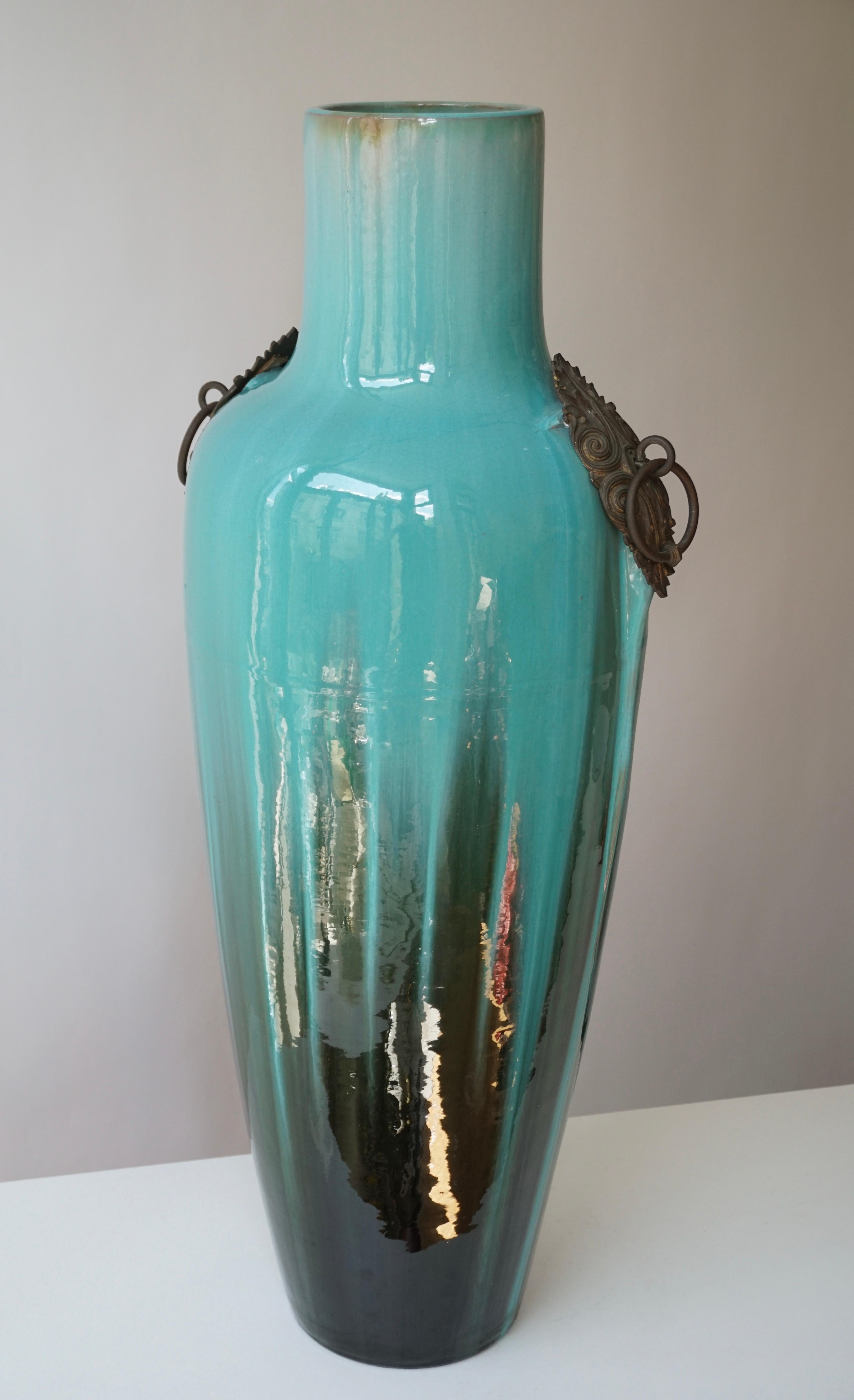 Large glazed vase by Clement Massier. Impressed maker's mark.
Clement Massier, Juan (AM)
Measures: Height 82 cm, width 35 cm, depth 28 cm.
Weight 12 kg.
  