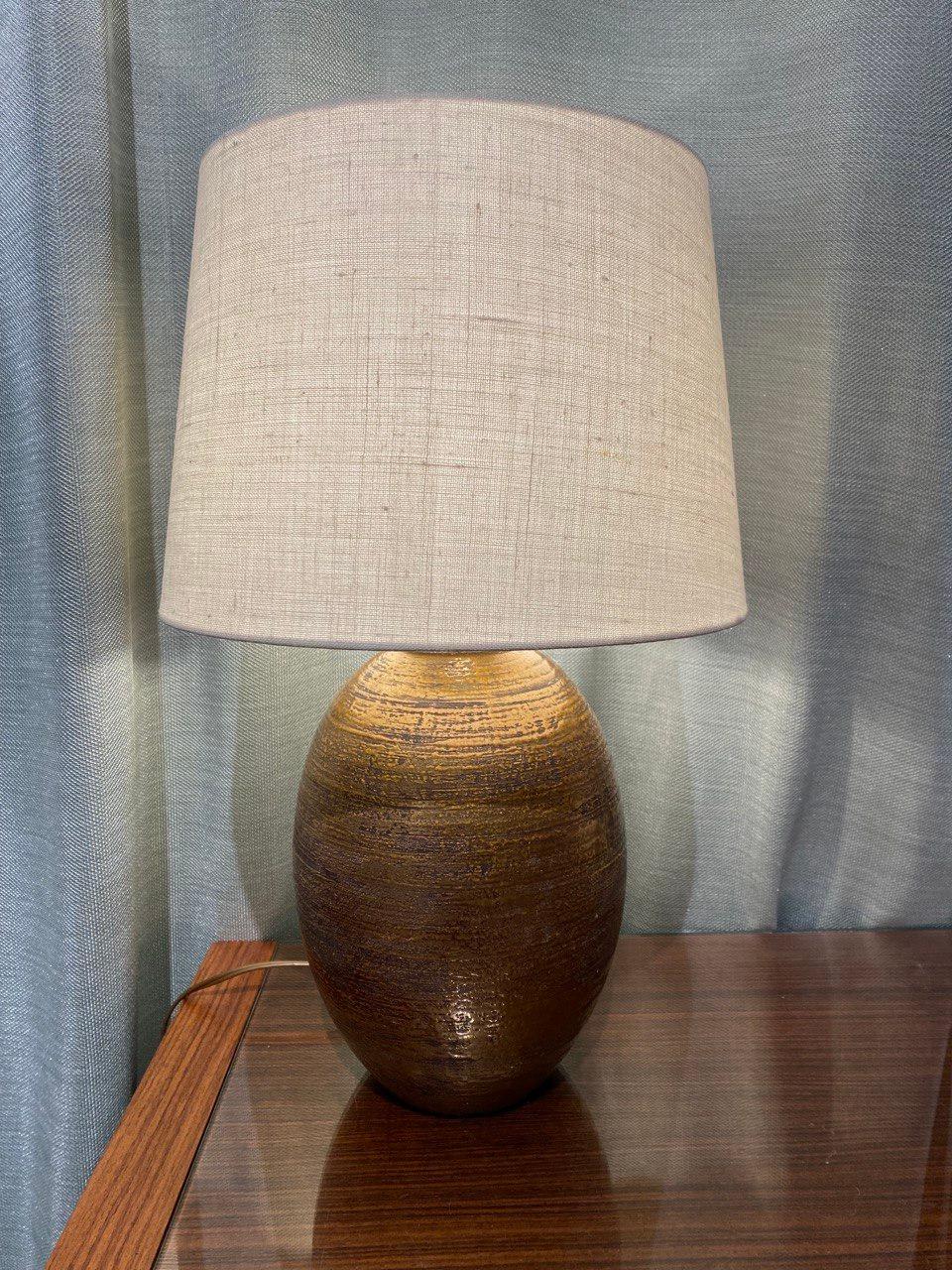 Ceramic very stylish table lamp by famous French studio KAZA from 1920s.
Marked under the base 