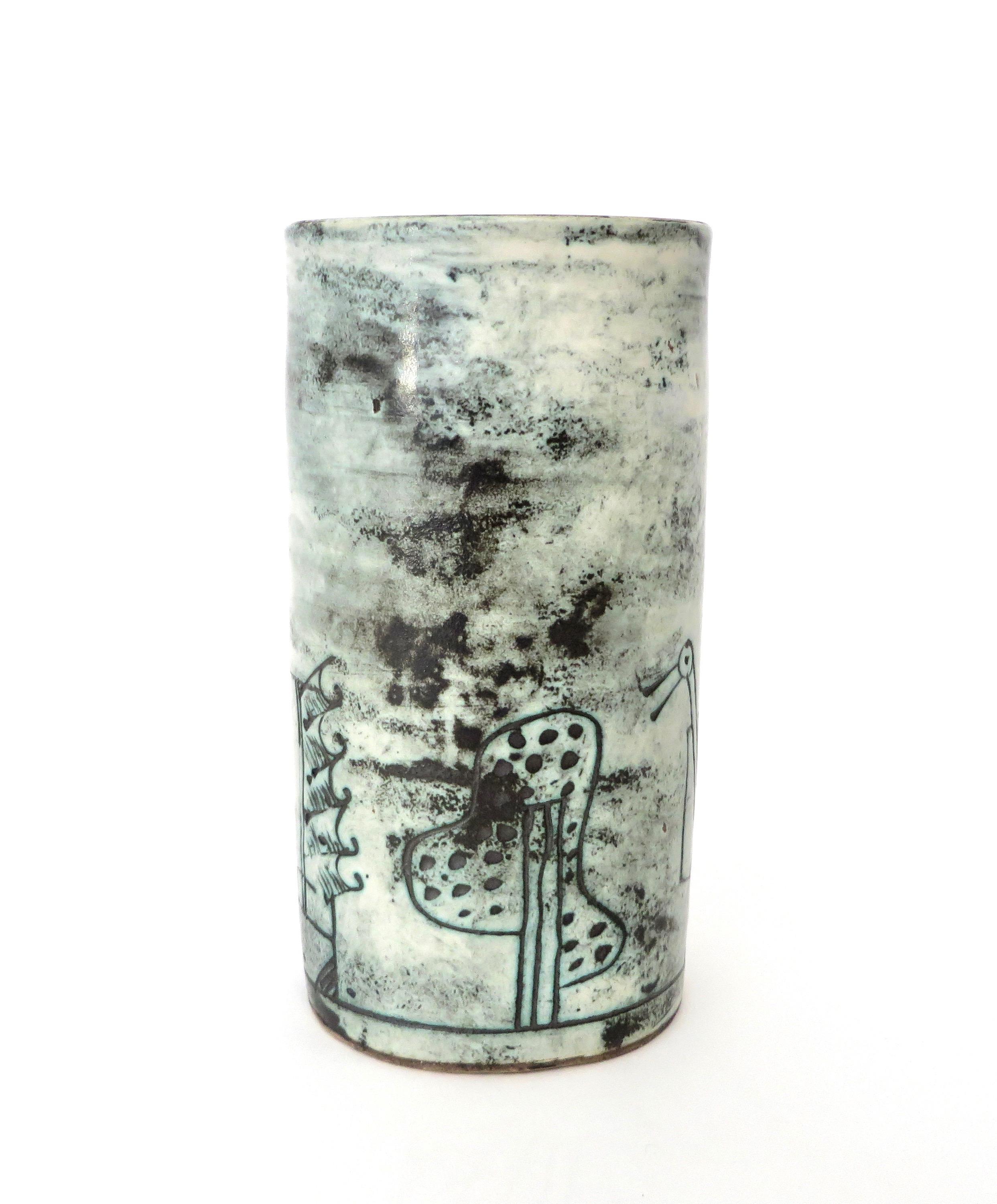 A French ceramic vase cylinder by noted artist Jacques Blin with wonderful image of a bird in his iconic light blue glaze and sgraffito decoration. No chips or restorations. Signed. 
La Céramique Francaise des Années 50. Pierre Staudenmeyer, pp
