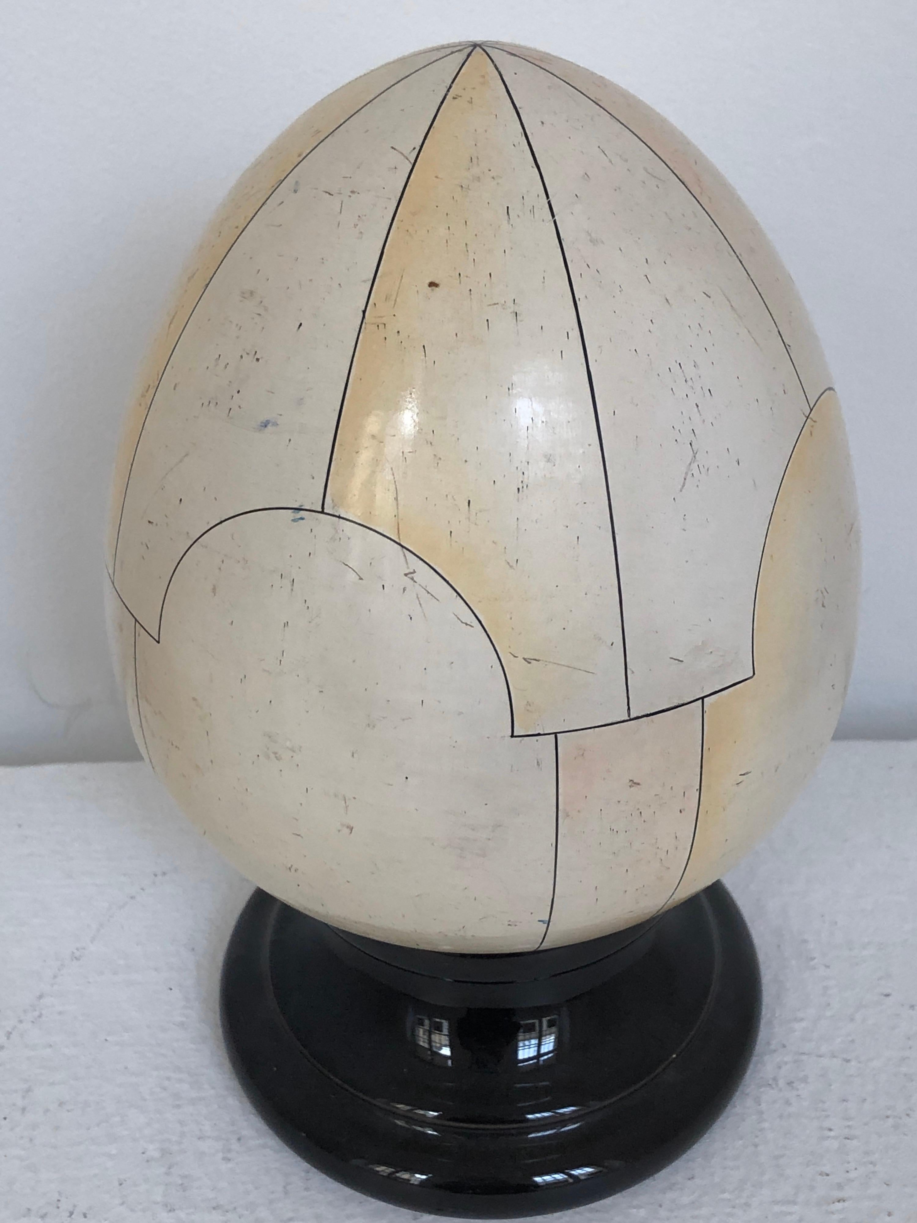 Magnificent piece of collection and very rare hollow ceramic sculpture egg enameled shell faux ivory 