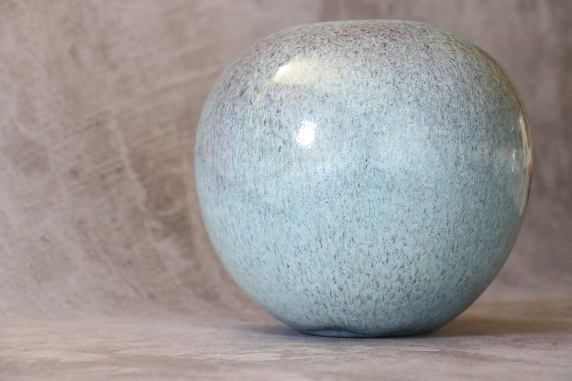 French Ceramic large ball vase by Marc Uzan - circa 2000.
Delicate enamelling in shades of blue and some touches of purple - Ring neck.
Signed under the base
Very good condition

--------------------------
Born in Sousse, Tunisia in 1955, Marc