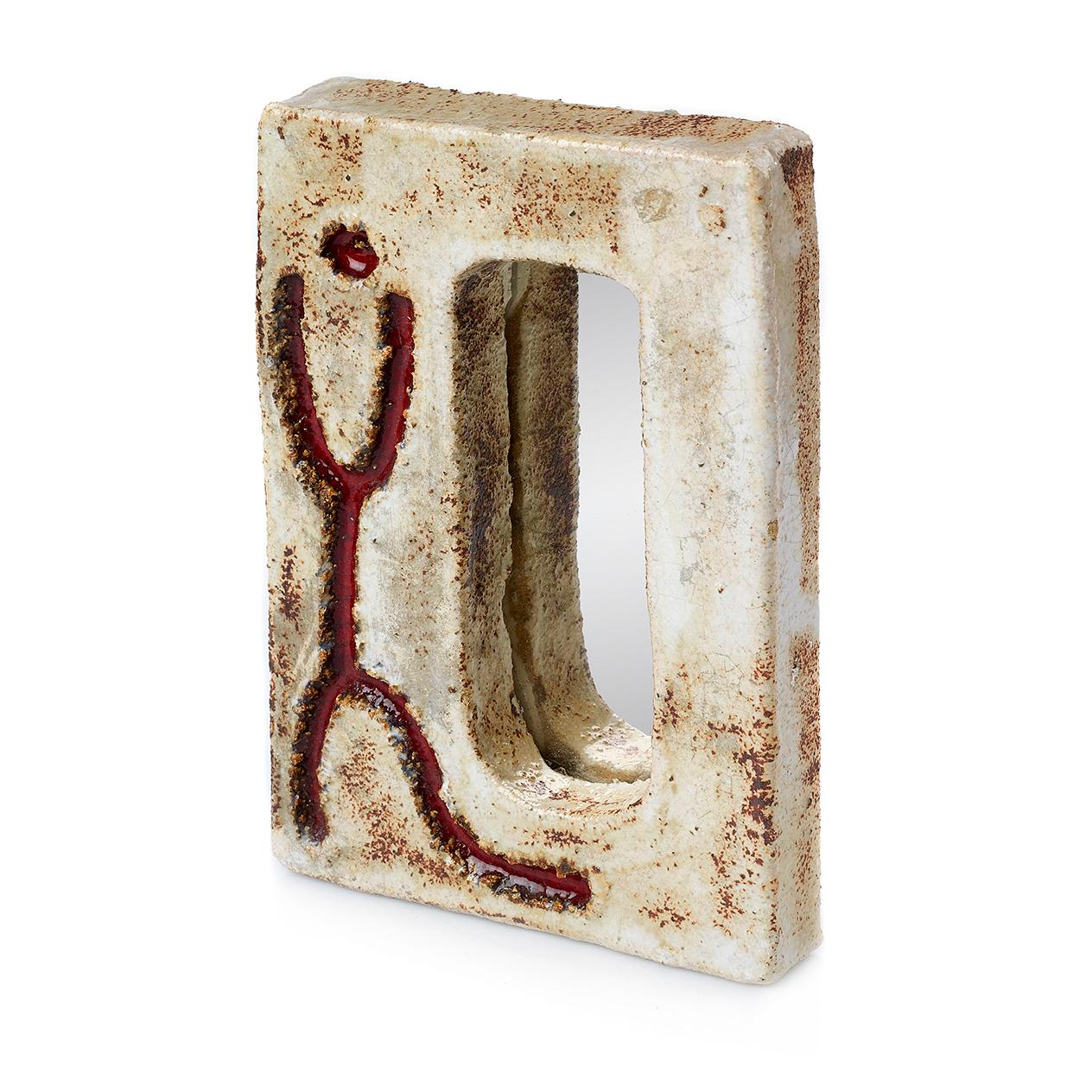 A sculptural ceramic mirror from France circa 1950 by Galerie Pallisy of  Vallauris on the French Riviera. Featuring a vibrant milky glaze and a red incised abstract dancing figure. Of the same era as Juliette Derel. 

Instagram @ahareintheforest 