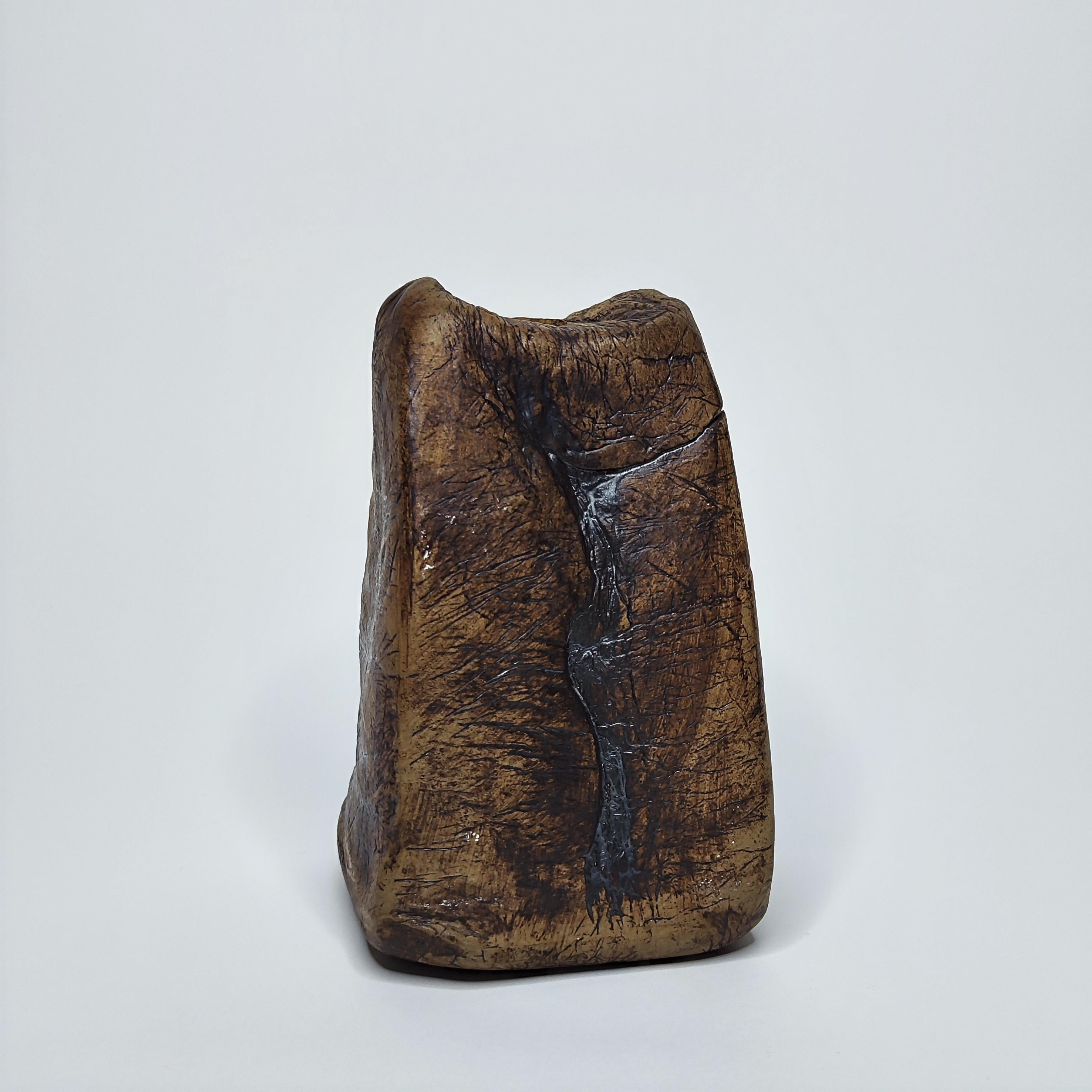 Superb ceramic and clay sculpture.
.
France, around 1960.
.
60s.
.
It is free form and recalls certain works of Cesar, 
In particular its compressions.
.
Dimensions :
Height : 17 cm
Width : 10 cm
Depth : 9 cm
.
Good condition.
.
Will be very well