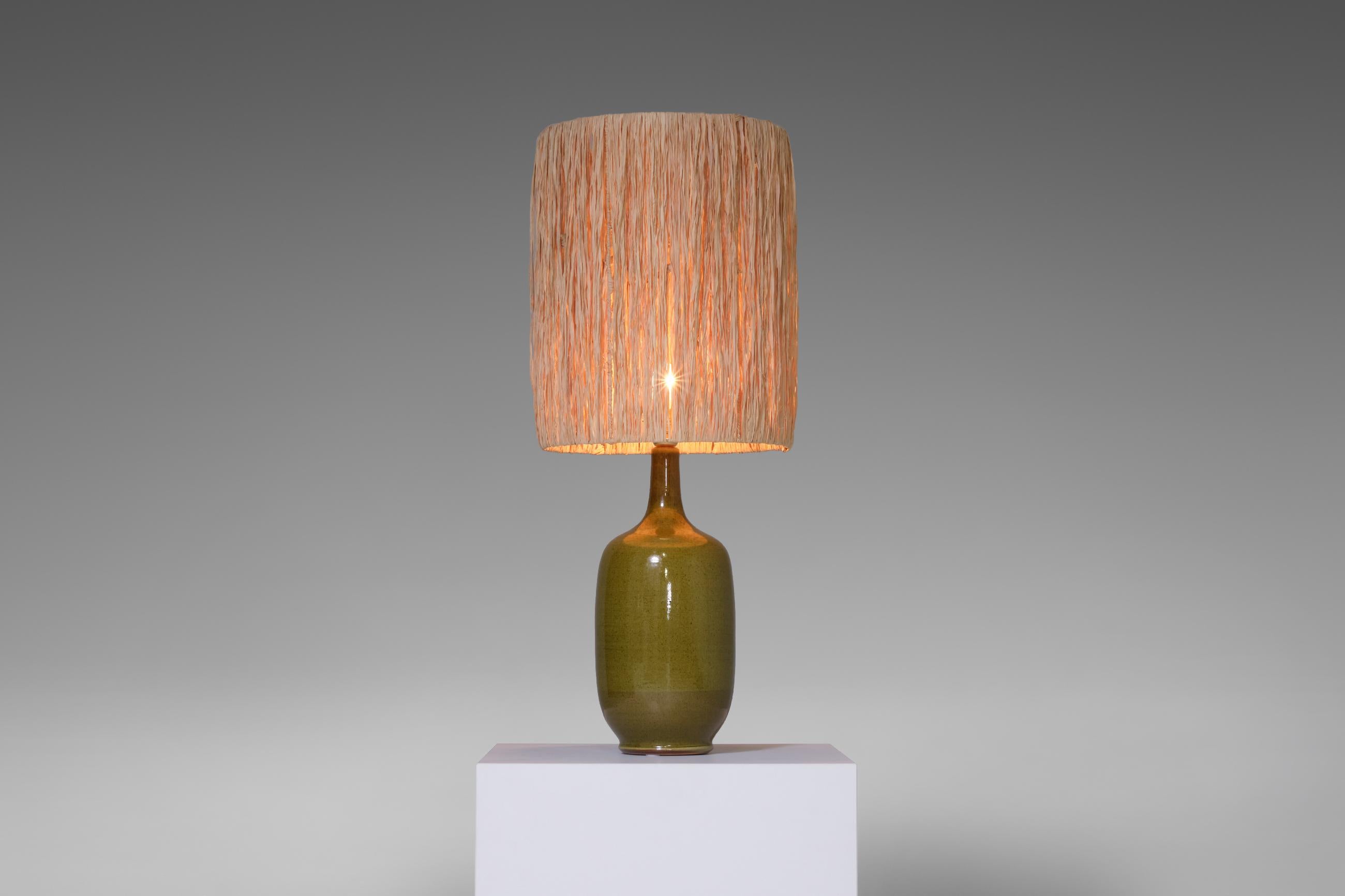 Unique ceramic table lamp by Christian Ziegler, France, 1975. Ziegler lived in the village of Draguignan, Provence region. The lamp has a beautiful elegant shape made out of orange clay with a fantastic green glaze and artistic graphic pattern. The