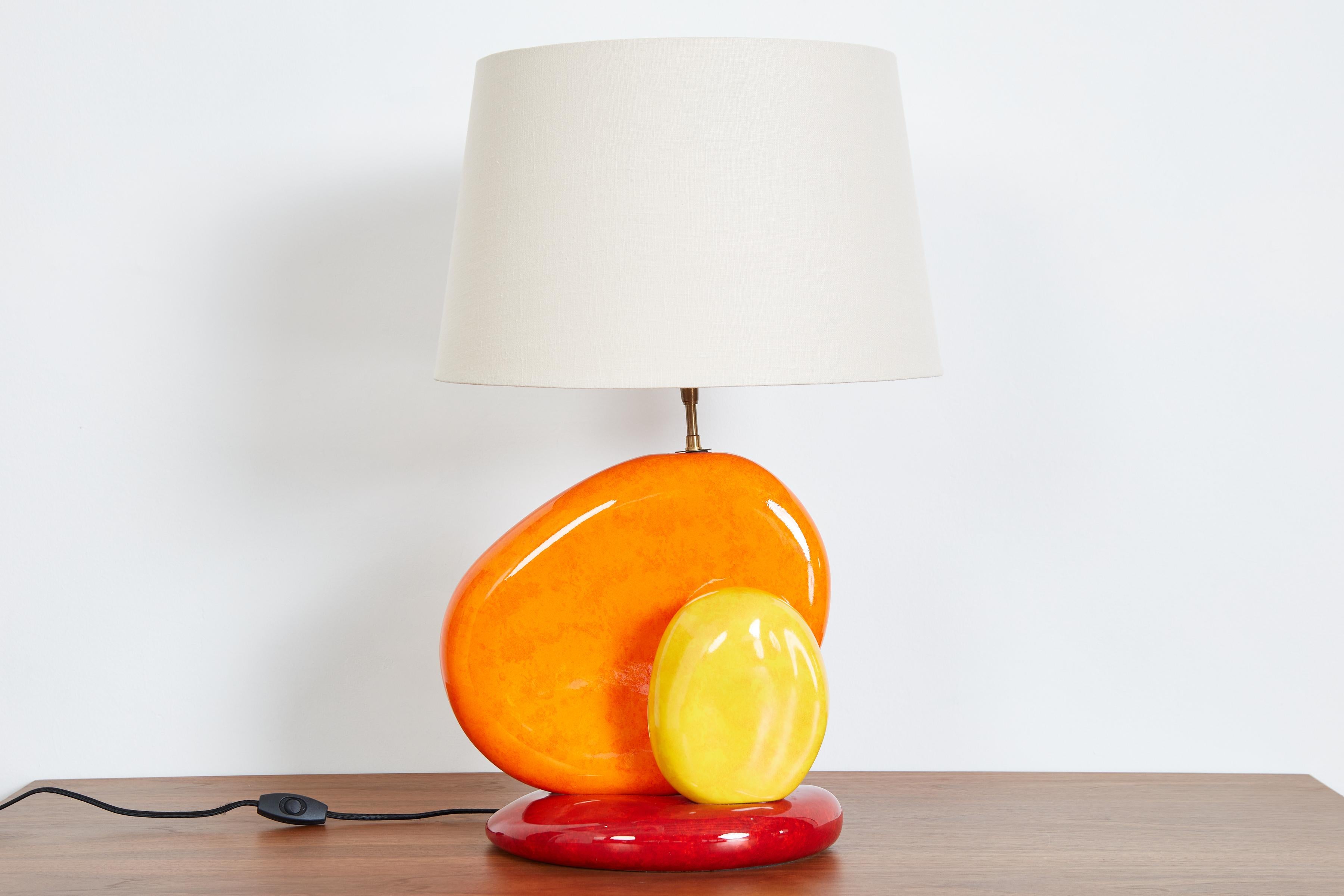 Colorful French ceramic table lamp with irregularly shaped stacked spheres. 
France, circa 1970s 
Newly rewired with new linen shade 


Dimensions: 
Height: 20 in Diameter: 13.5 in

Materials and Techniques: 
Ceramic

Place of Origin: