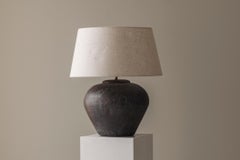 French ceramic table lamp with linen shade from the 1950s.