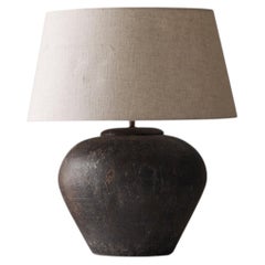 French ceramic table lamp with linen shade from the 1950s.