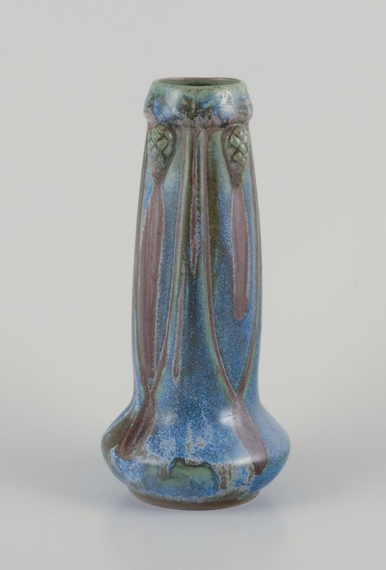 French ceramic vase with glaze in blue, green, and brown shades.
1930s/40s.
Perfect condition.
Dimensions: H 22.0 cm x D 10.0 cm.