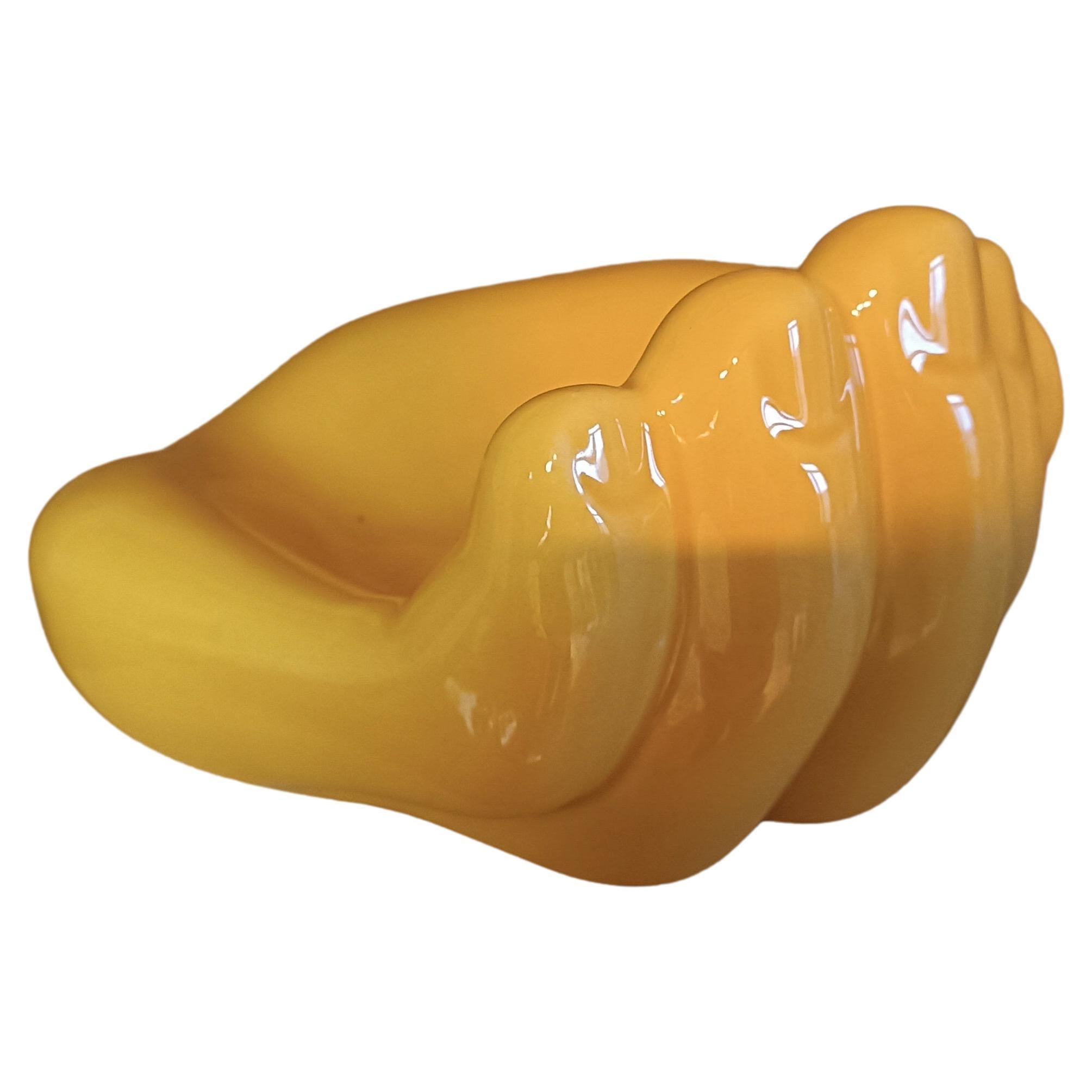 French ceramic Vide Poche circa 1960s - in the style of Georges Jouve, Ruelland

Large hand-shaped pocket organizer. Mid-century plaster enameled with glossy yellow enamel circa 1960s.
In the style of the bear-paw-shaped vide poche by Georges Jouve,