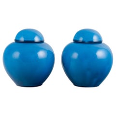 French ceramicist, a pair of lidded jars in turquoise glaze. Mid-20th century.