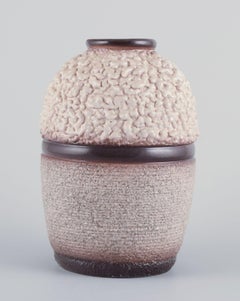 French ceramicist. Ceramic vase. Lava glaze in light and brown colours.