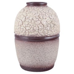 French ceramicist. Ceramic vase. Lava glaze in light and brown colours.