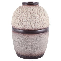 French ceramicist. Ceramic vase. Lava glaze in light and brown colours.