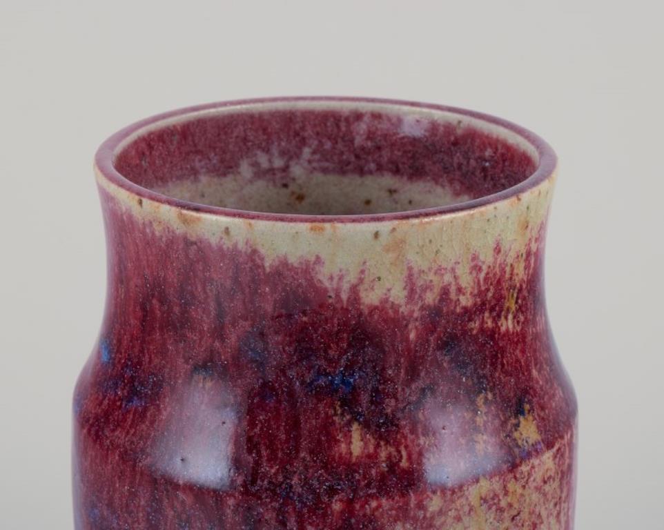 Mid-Century Modern French ceramicist. Unique ceramic vase. Glaze in shades of blue-violet. For Sale