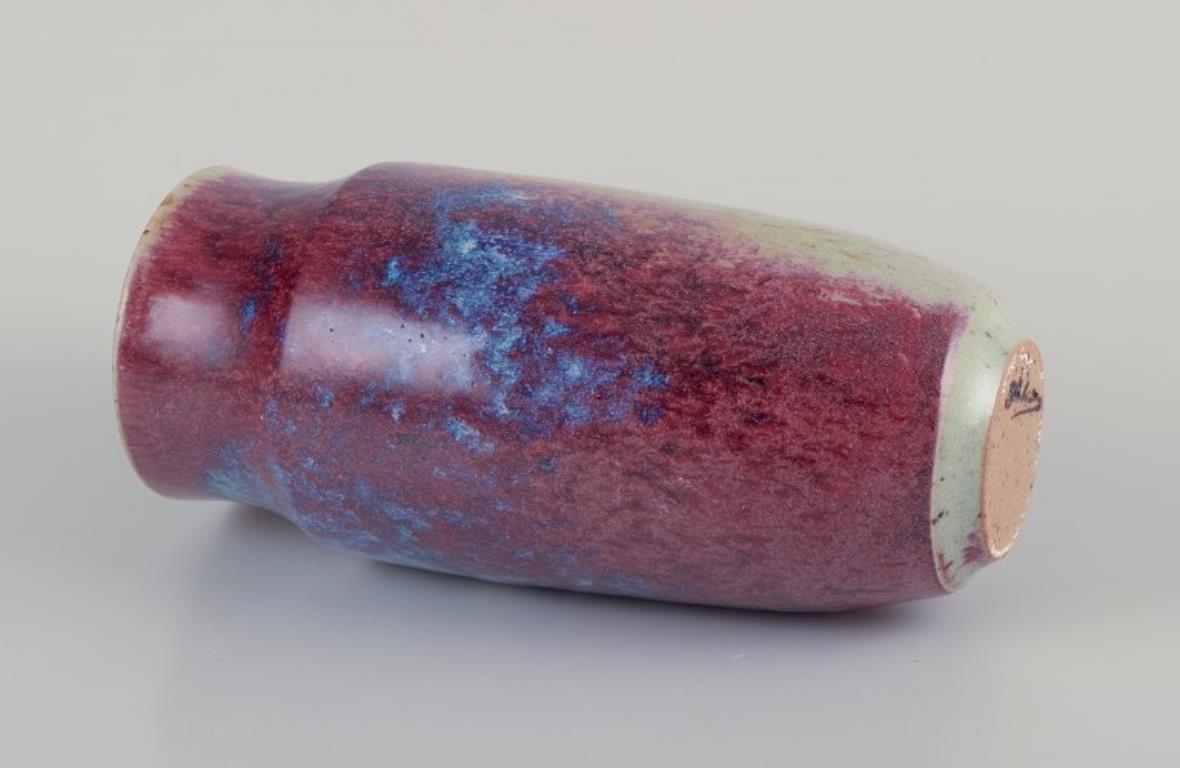 20th Century French ceramicist. Unique ceramic vase. Glaze in shades of blue-violet. For Sale